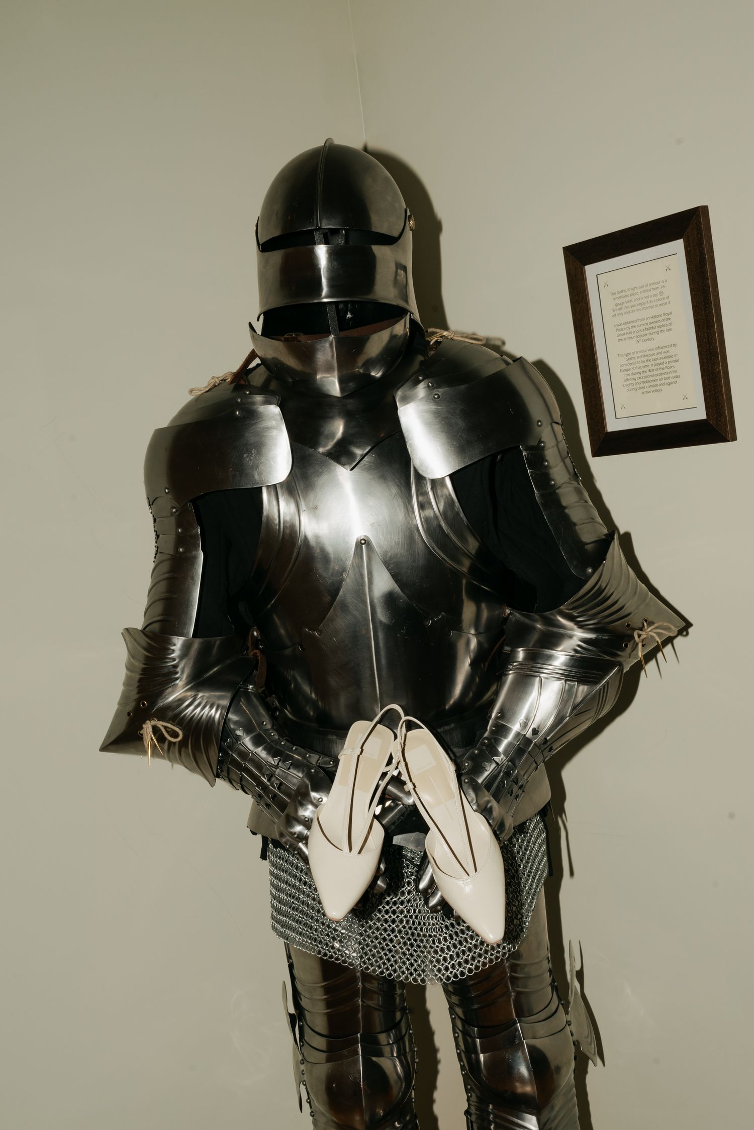 knight holding heels