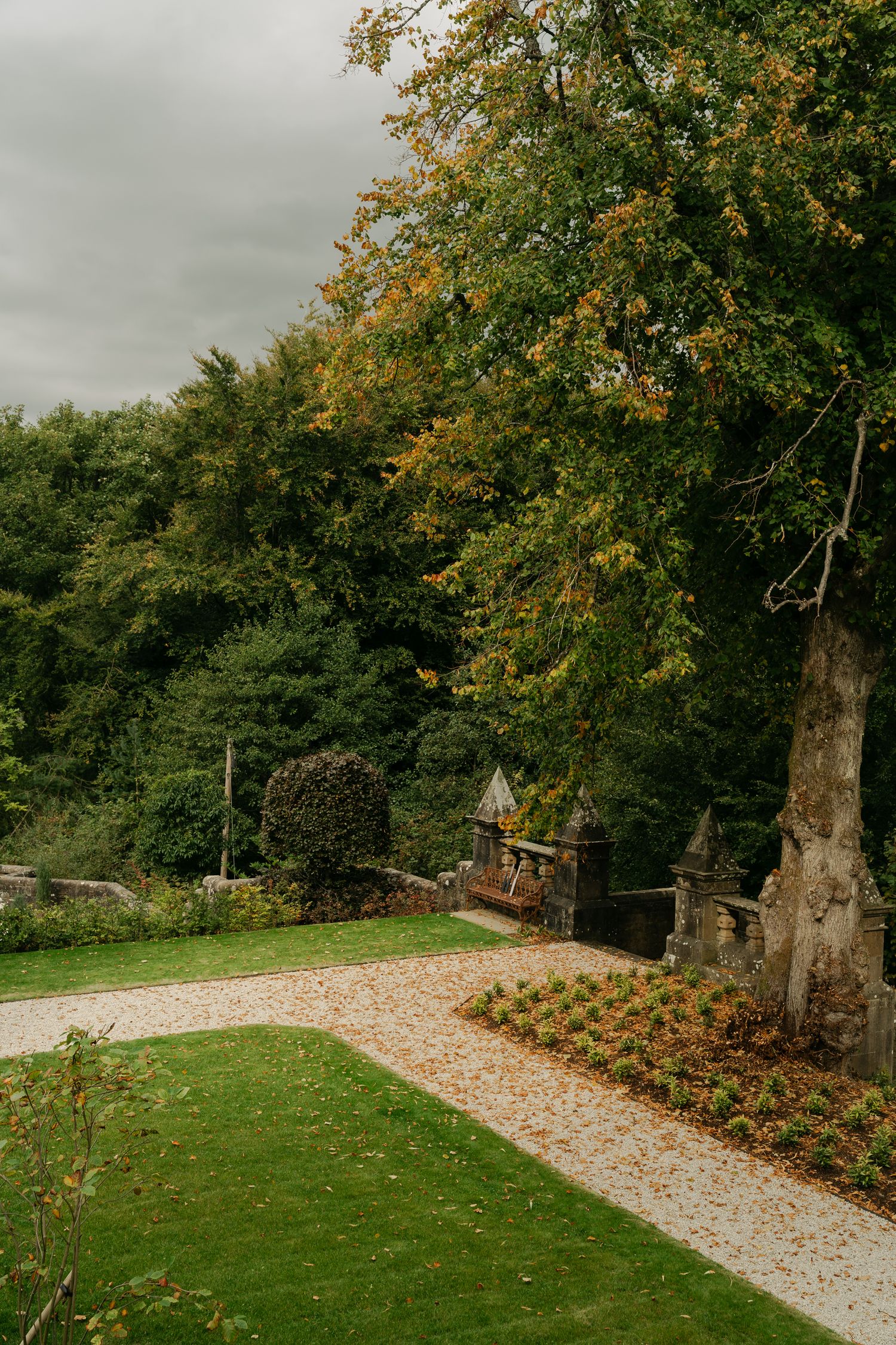 courtyard in Scotland at a castle with fall leaves on the ground