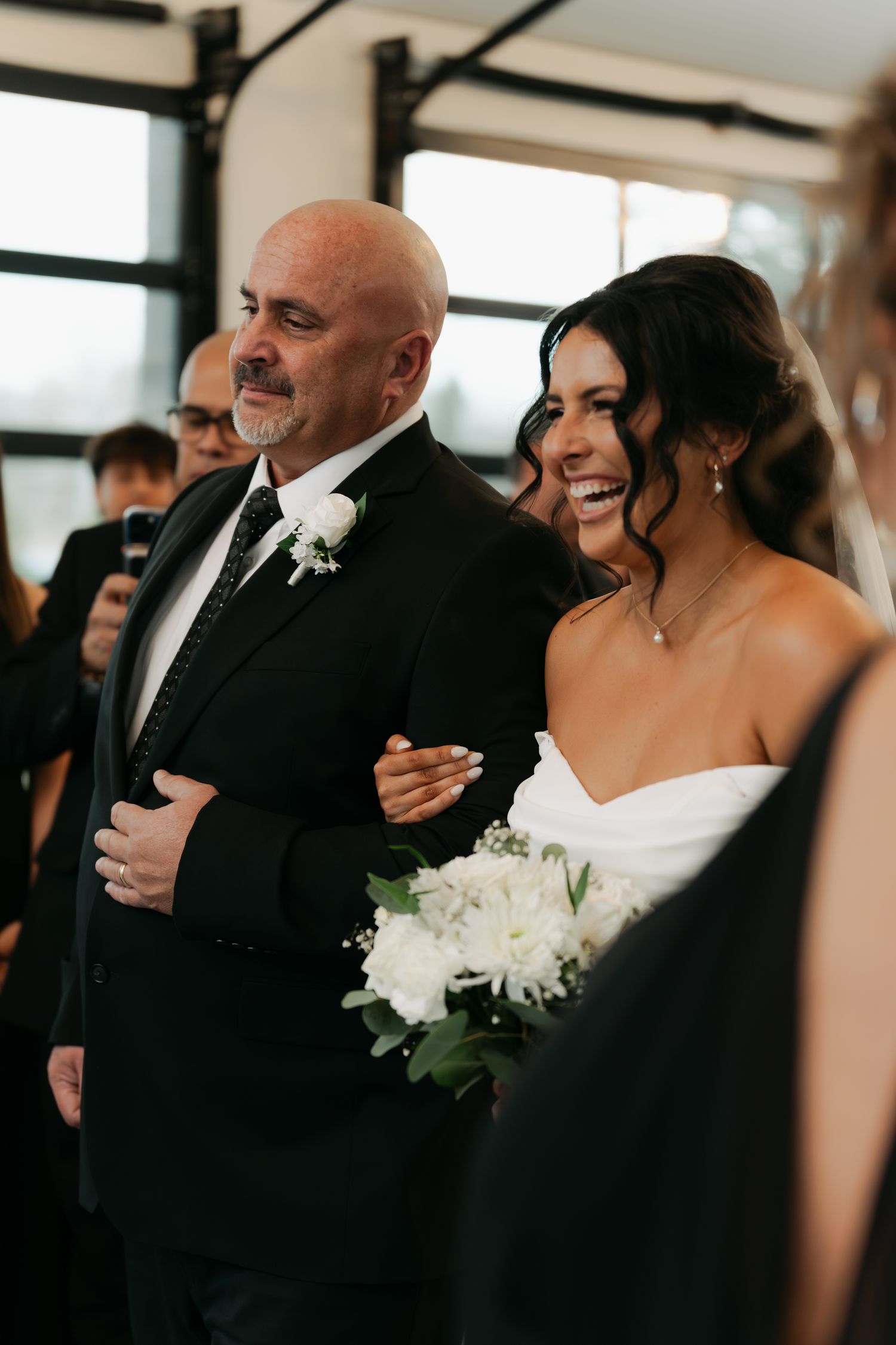 father walking his daughter down the aisle