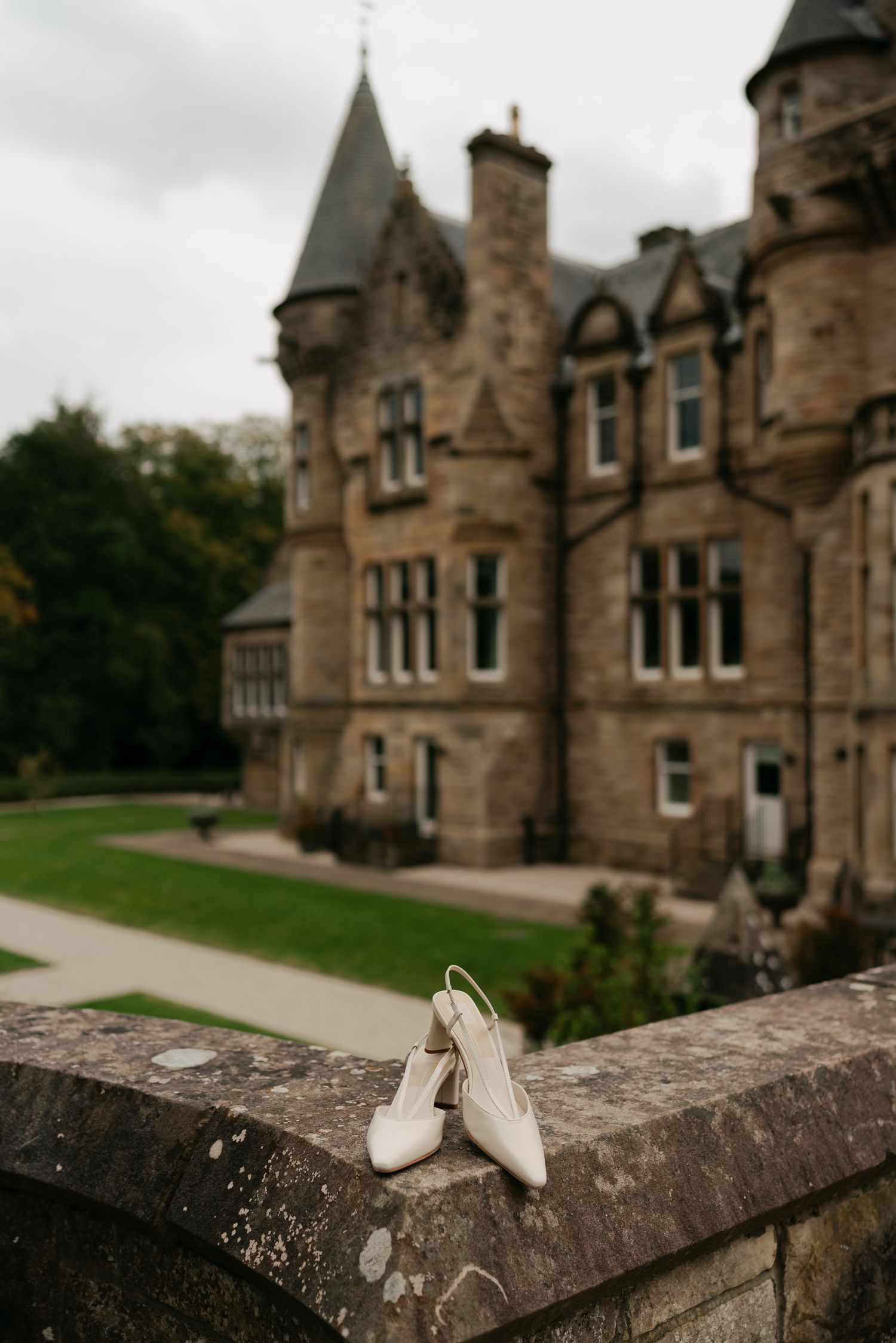 shoes with a castle in the background