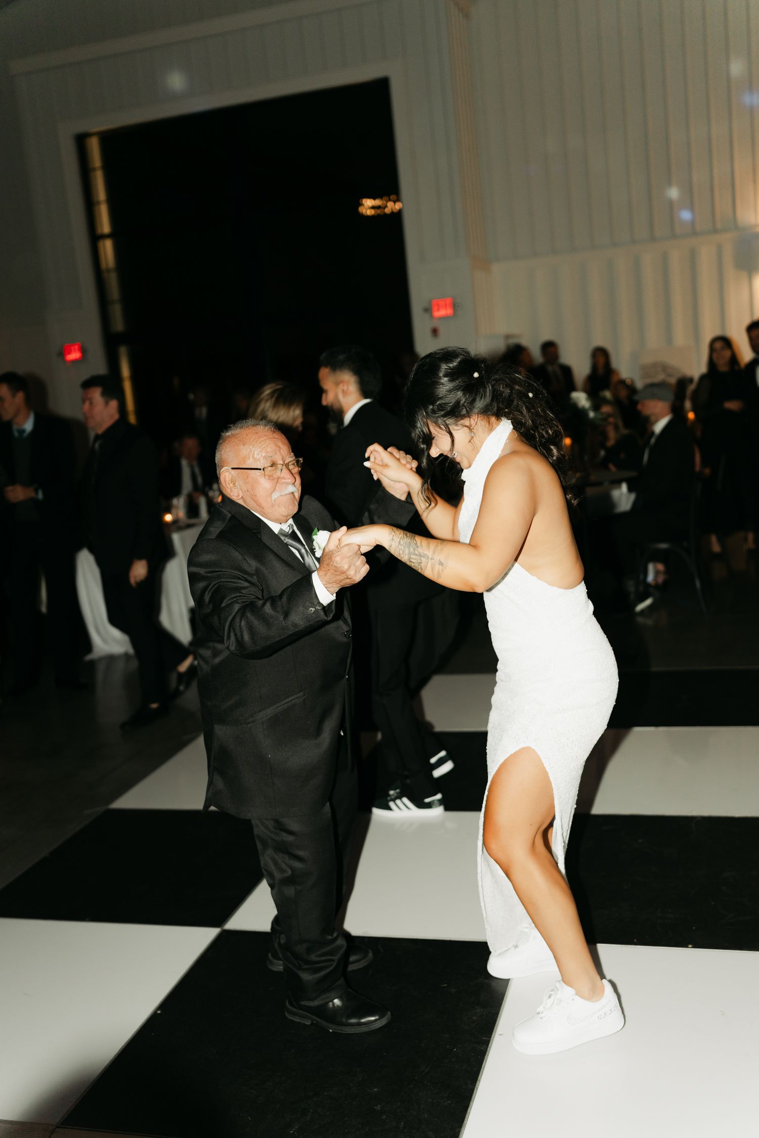 bride and uncle dancing on a dance floor