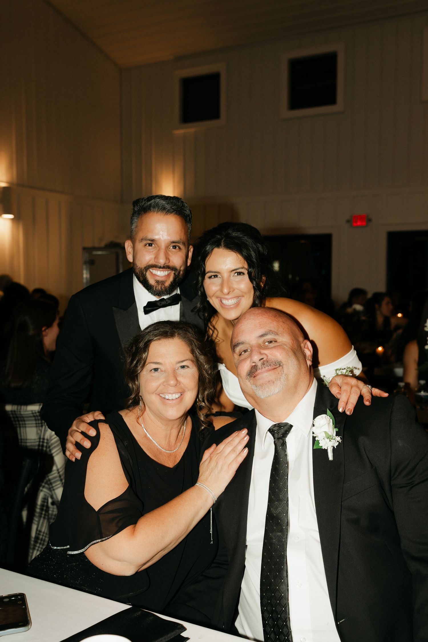 bride and groom with family