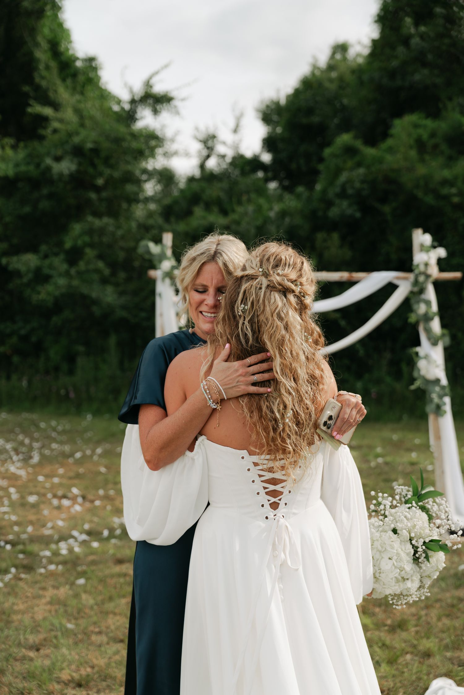 mother hugging her daughter
