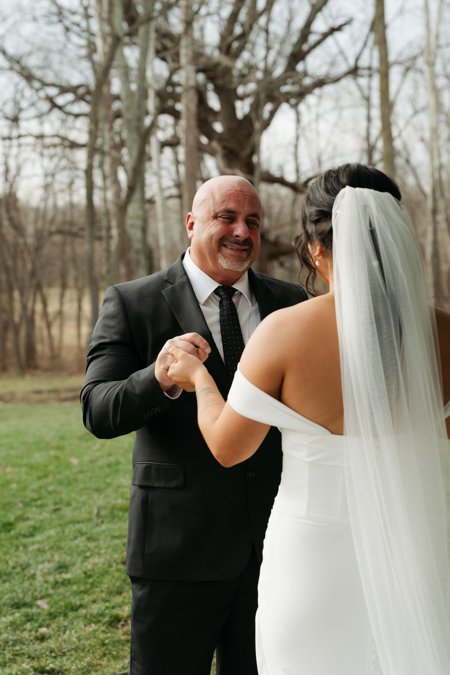 father and daughter looking at each other
