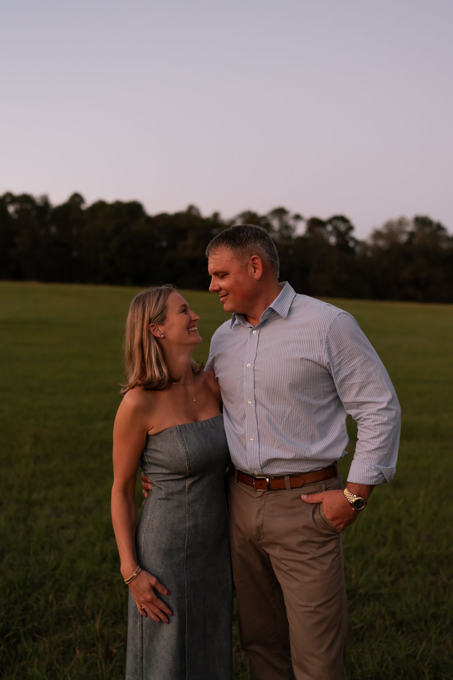 husband and wife holding each other