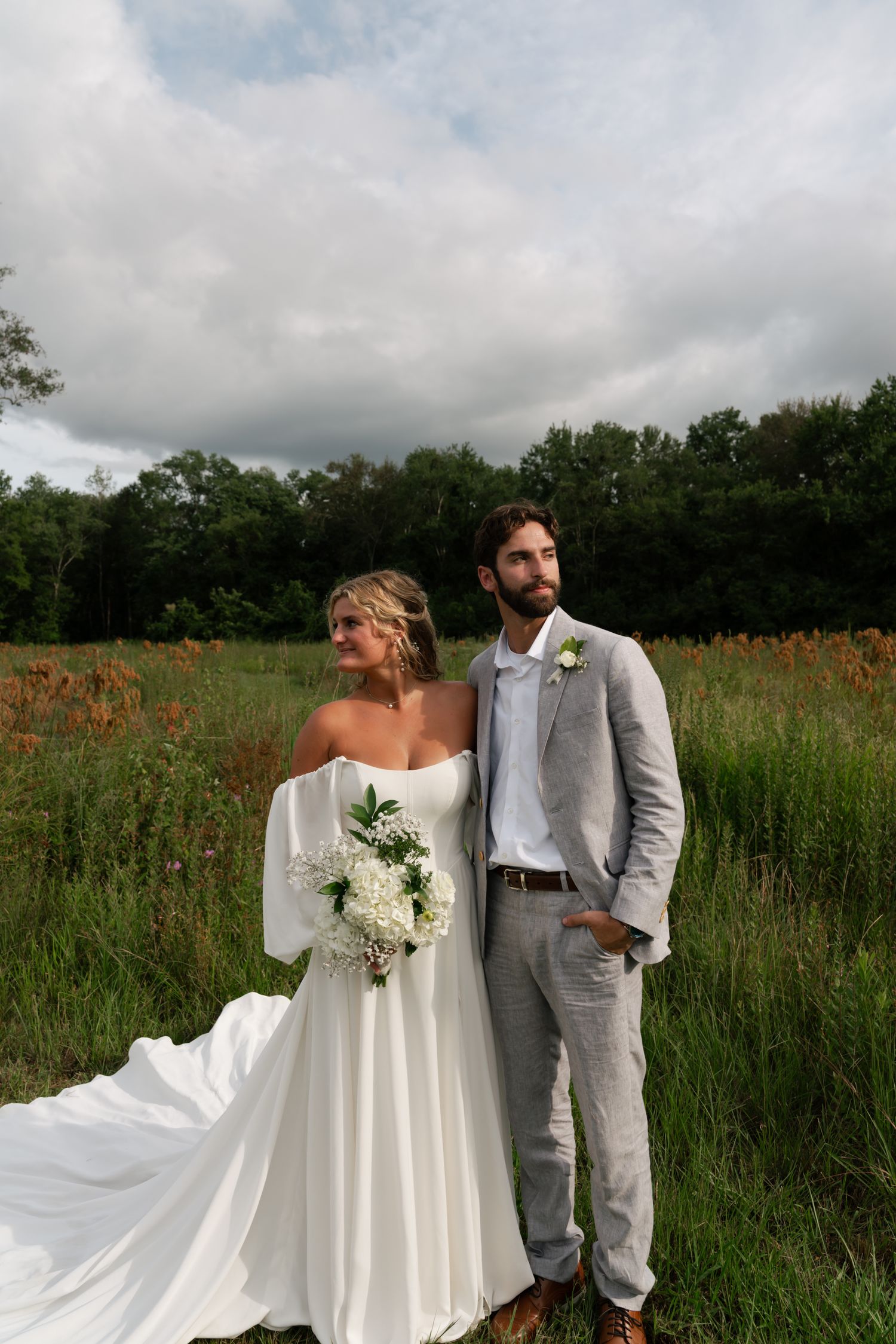bride and groom hugging