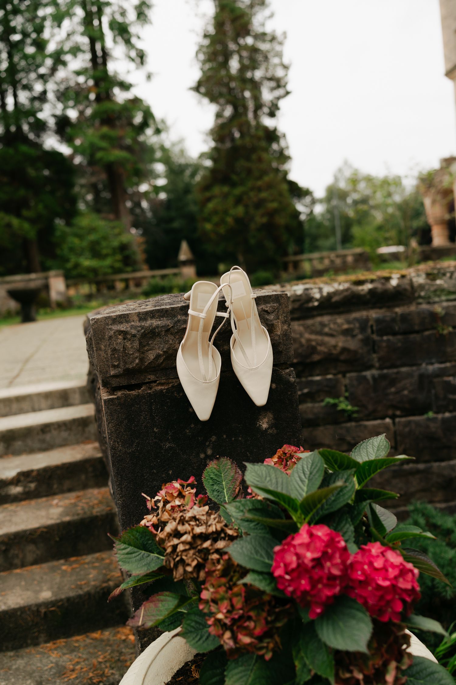 heels on staircase railing