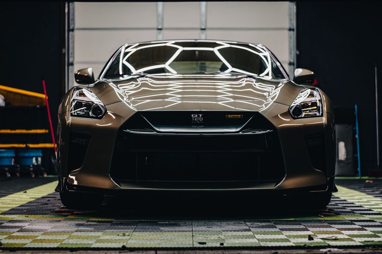 Striking automotive photography of a Nissan GT-R, showcasing bold design, sharp details, and dramatic lighting for a powerful look