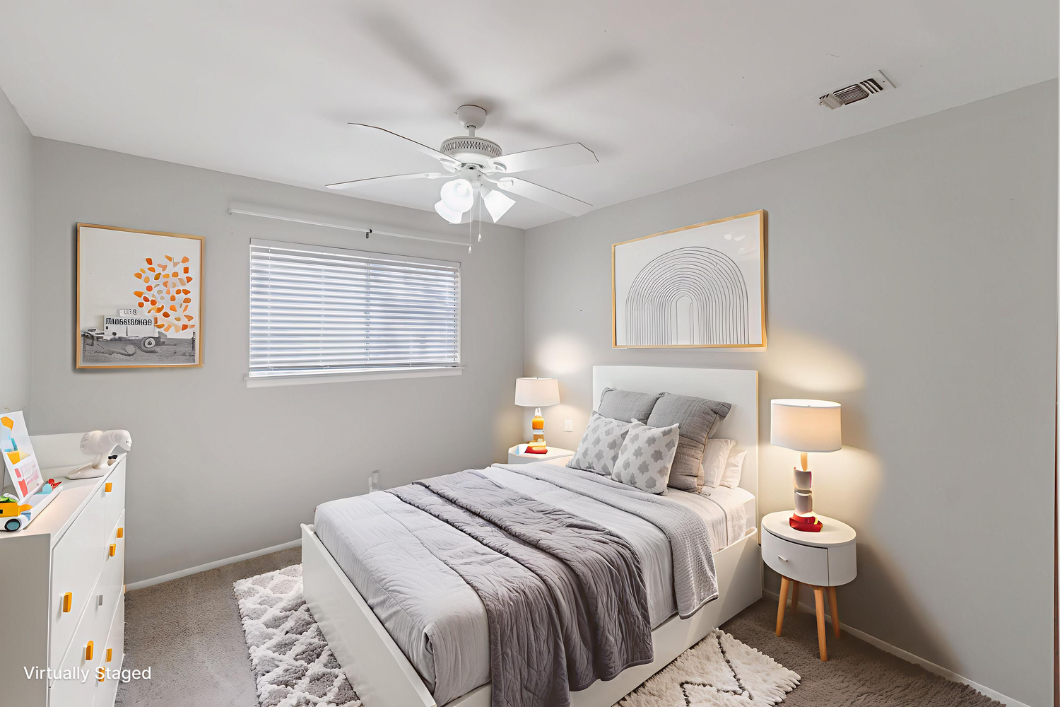 Modern bedroom interior with gray bedding, white walls, and contemporary decor featuring side tables and ambient lighting.