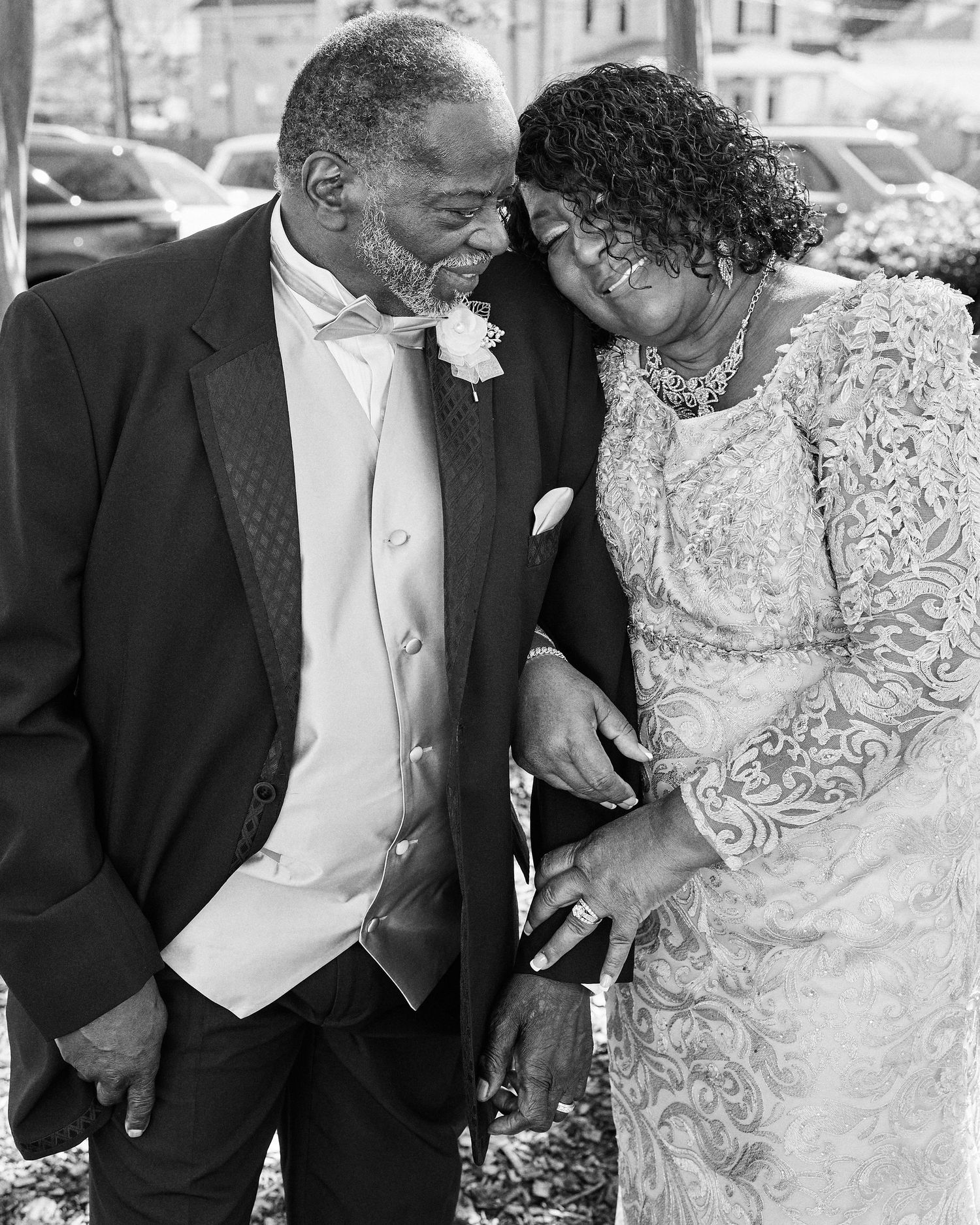 Black and white wedding photos capturing intimate moments between newlyweds.
