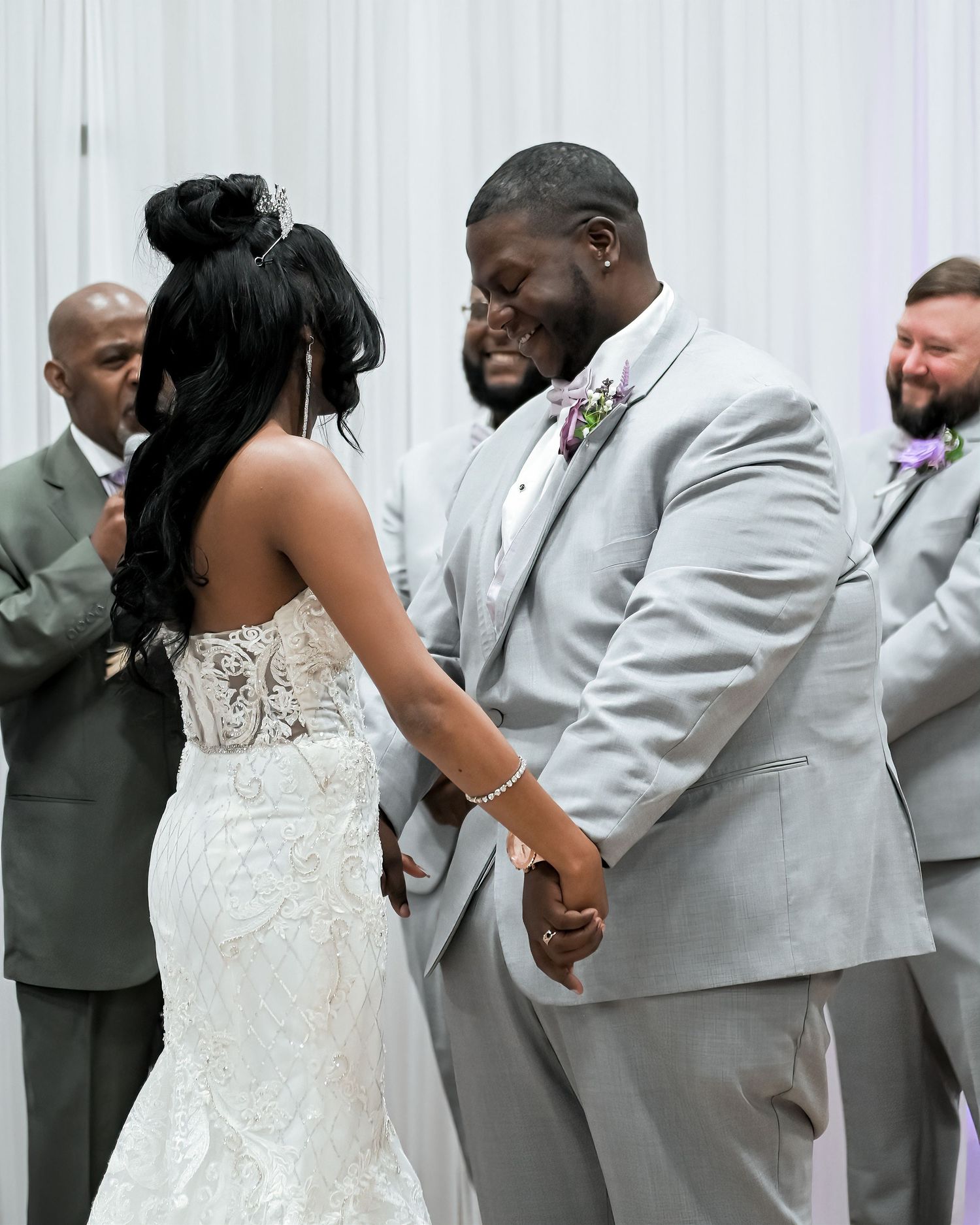 Wedding party sequence showing celebration moments in grey formal attire.