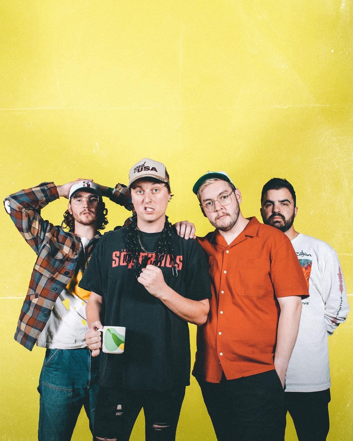 State Champs posing together against a bright yellow background.