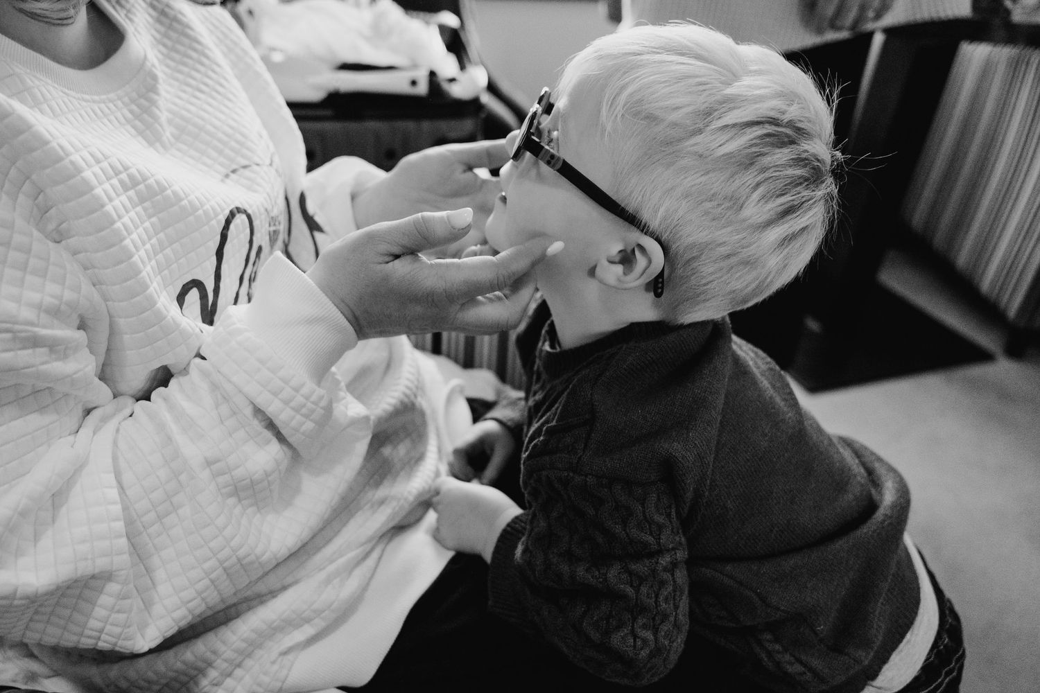 Black and white photos showing intimate hospital maternity moments with a newborn baby and medical team.  Wedding PHOTOGRAPHER Trim Castle