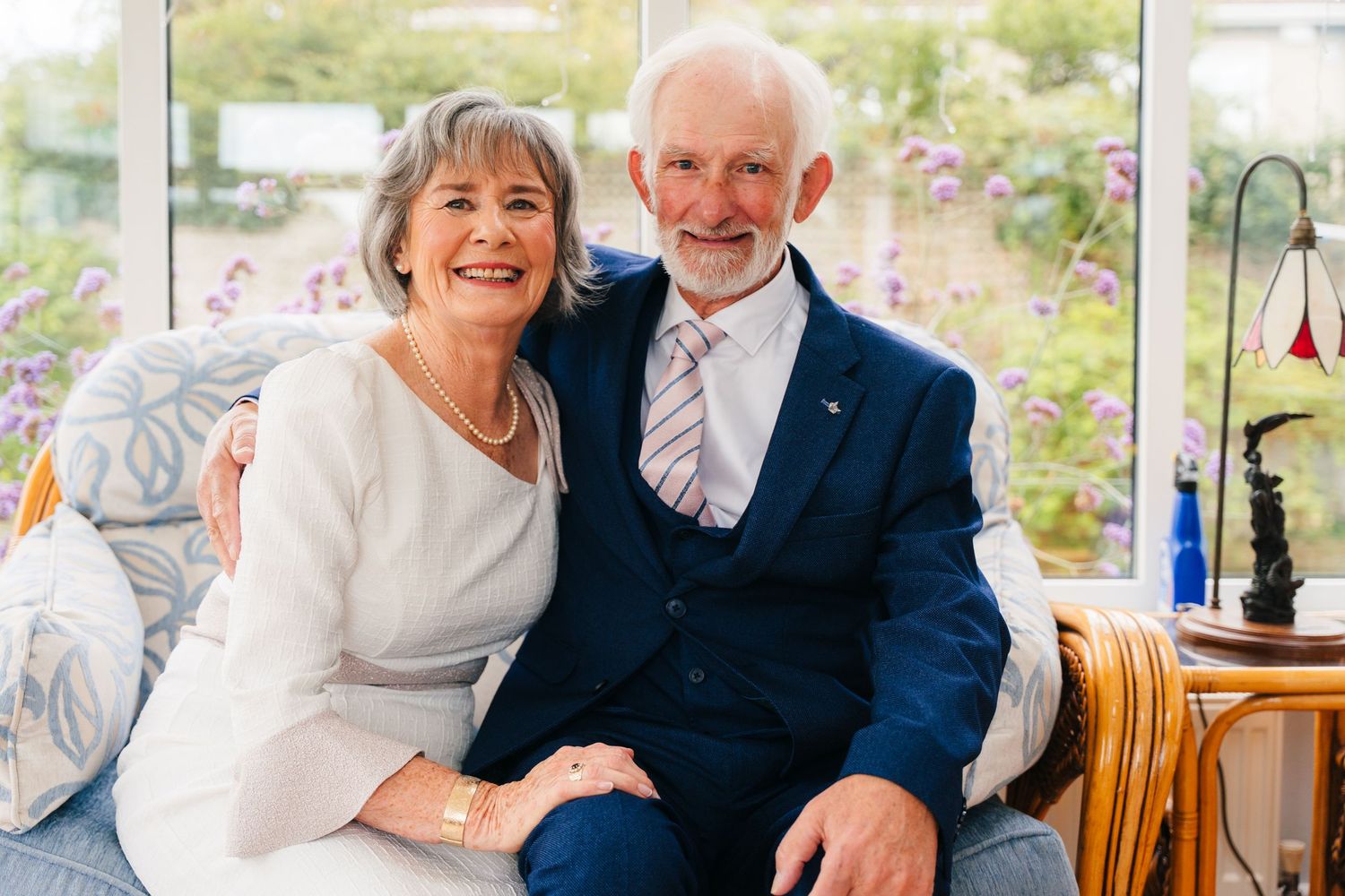 Elegant wedding reception celebration featuring clear umbrellas and guests in formal attire. The Dean Dublin Wedding Photographer