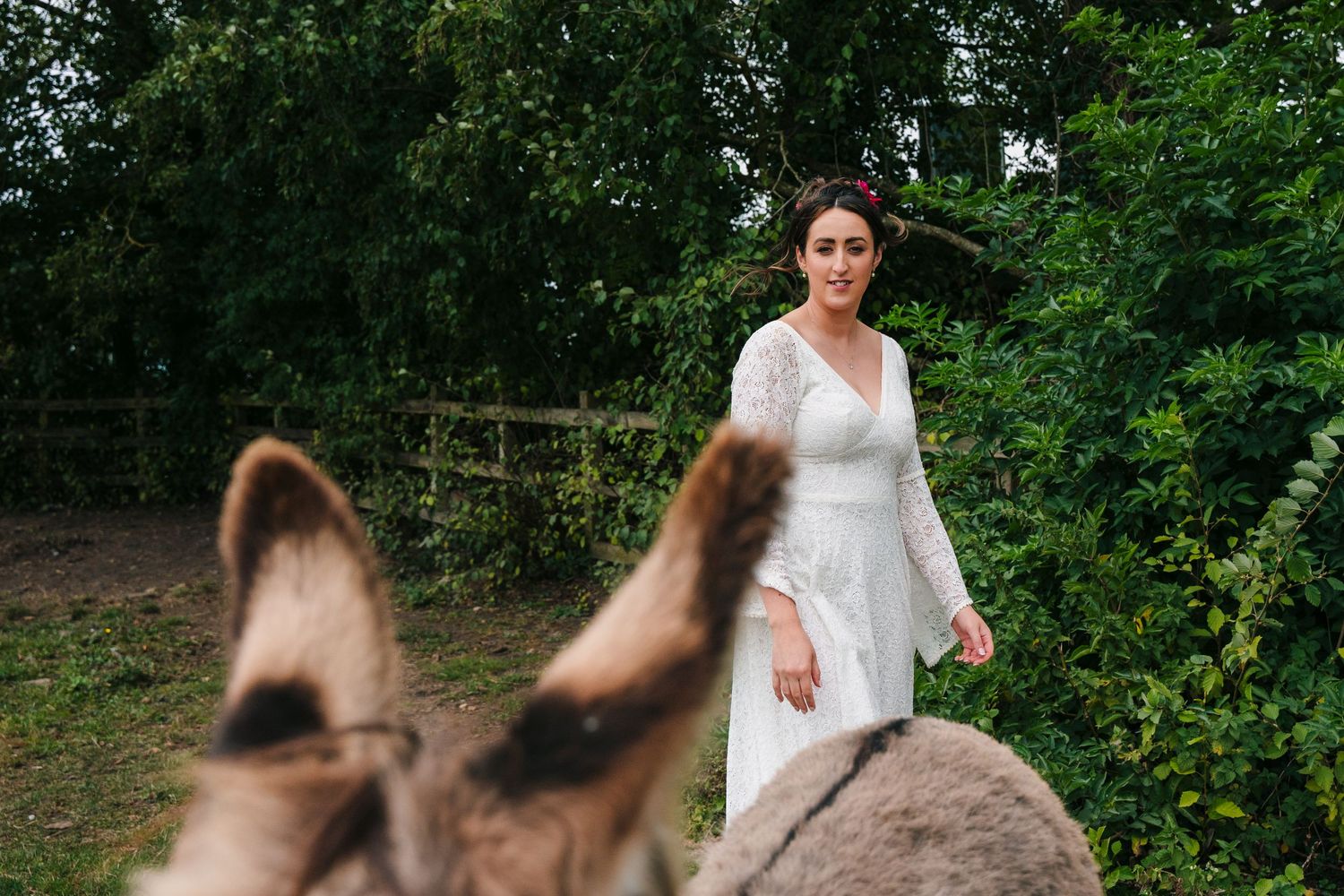 Motion blur sequence of people dancing outdoors against green foliage background. Wedding Photography Trim Castle Ireland