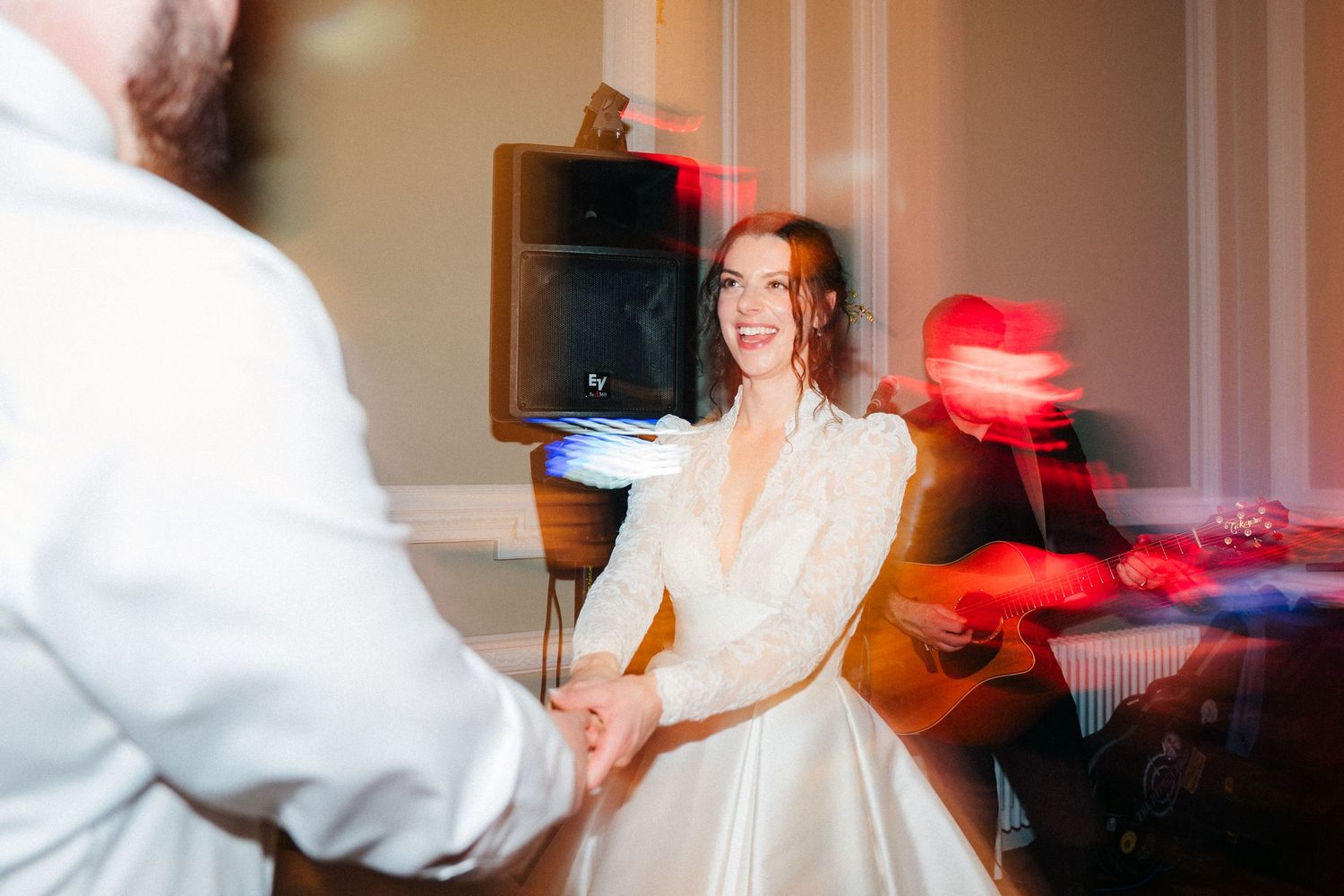 Blurred motion shots capturing energetic dancing and celebration at wedding reception. Stephens green club dublin Wedding photographer