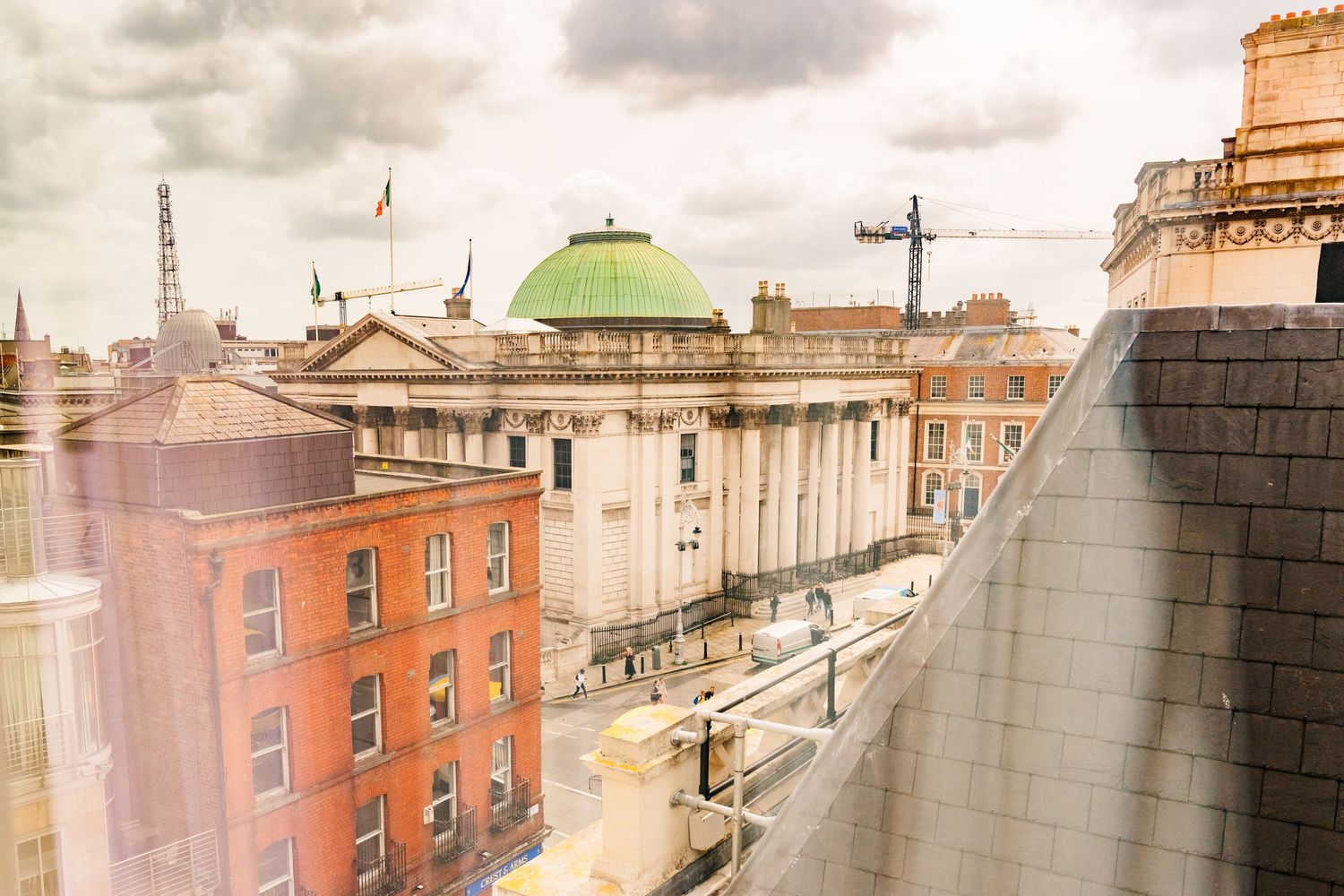 Cloudy cityscape view with historic buildings and domed architecture. PHOTOGRAPHER Dublin Ireland Wedding