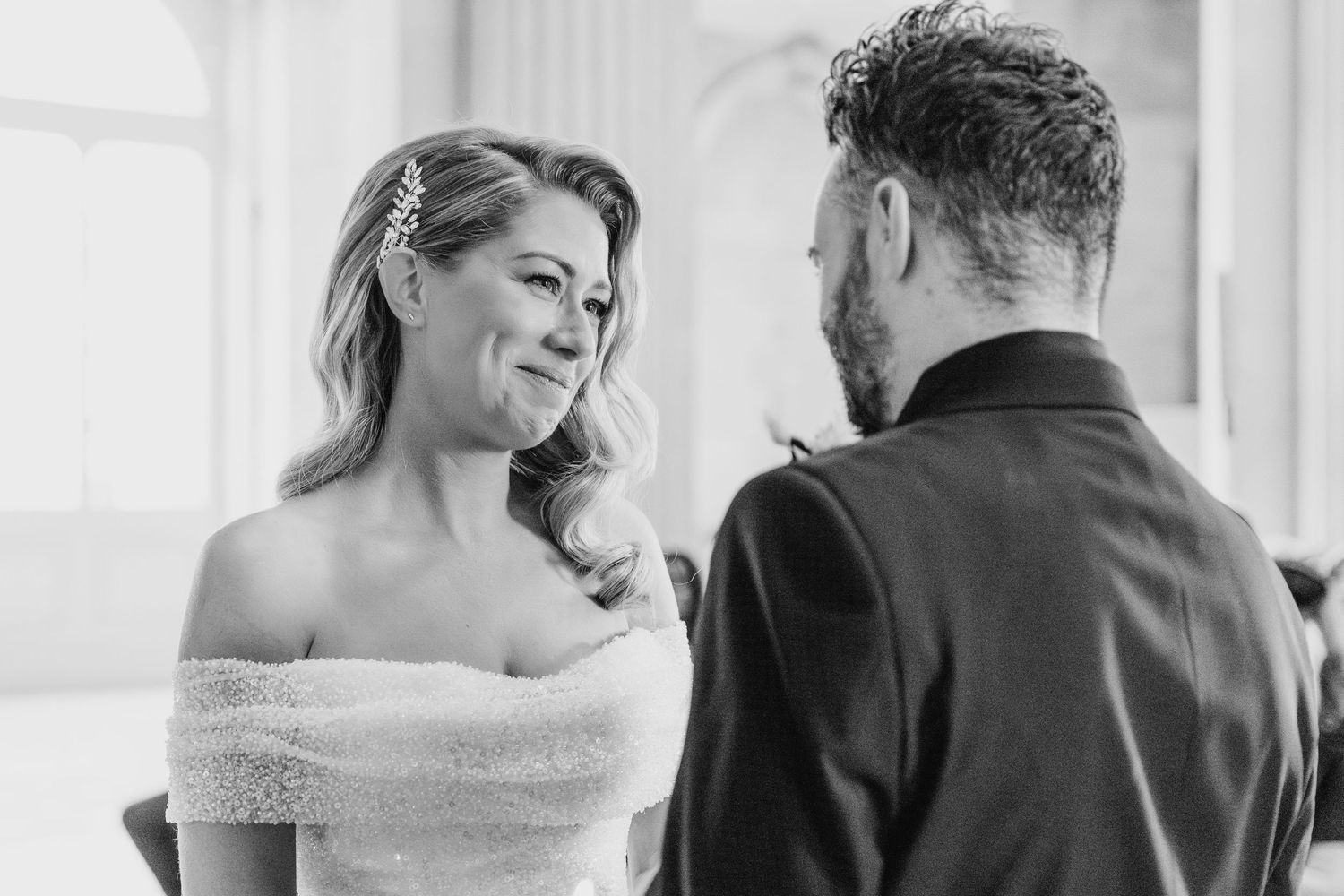 Intimate wedding moments photographed in a bright, classical interior setting.  city hall dublin wedding photos