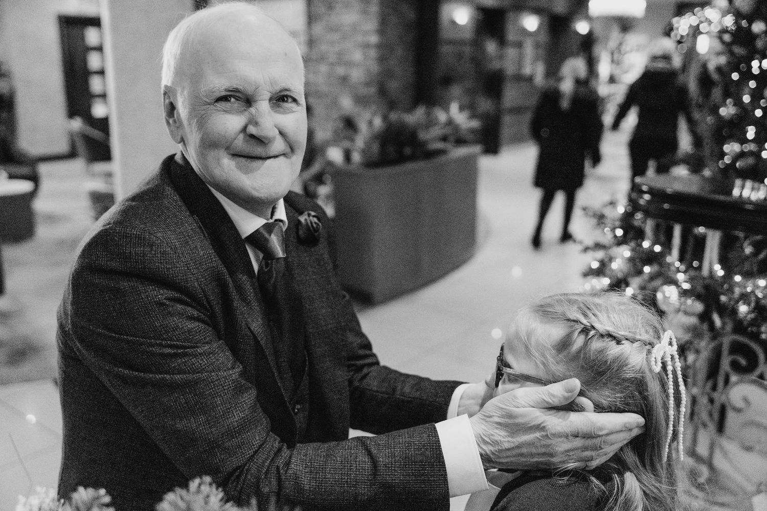 A collection of black and white candid moments showing wedding guests celebrating.  Wedding PHOTOGRAPHER Trim Castle