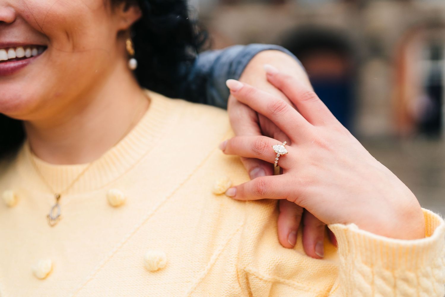 Close up of hands holding and peeling a fresh citrus orange or tangerine fruit. Proposal Dublin Photographer