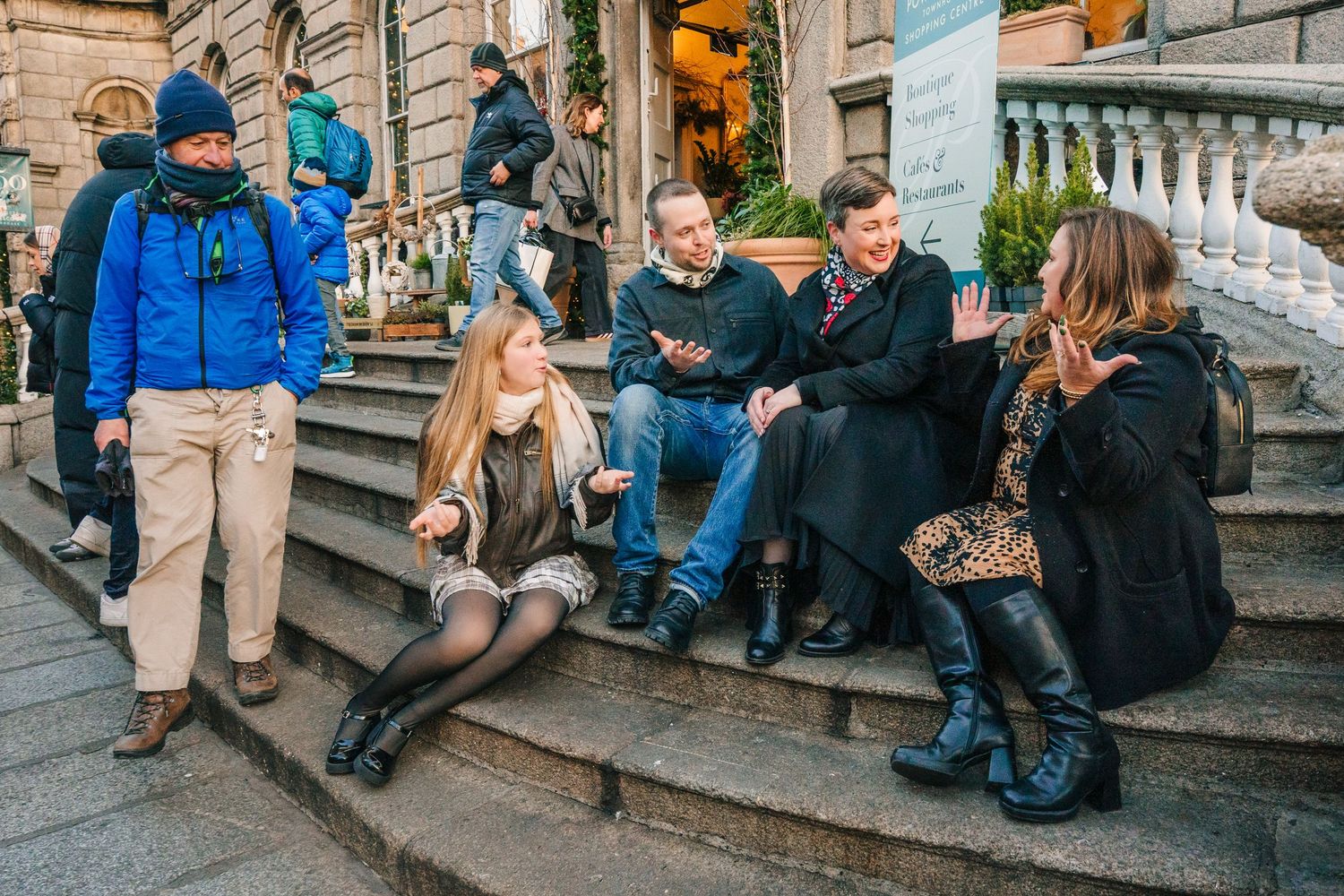 Natural family photography in Dublin city streets by a family photographer Dublin creating timeless holiday memories