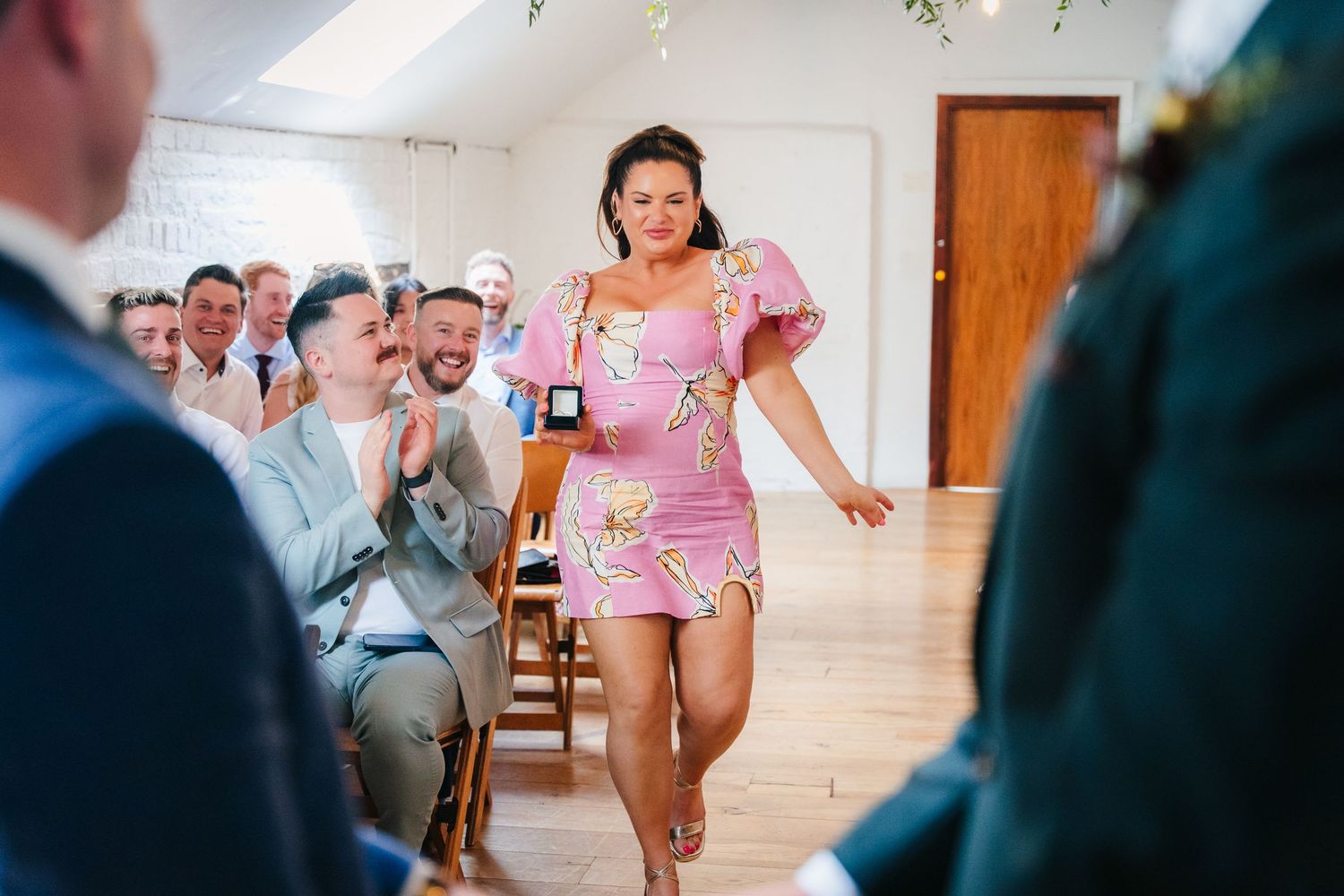 Wedding reception venue decorated with elegant greenery and natural lighting. Same sex wedding PHOTOGRAPHER Dublin