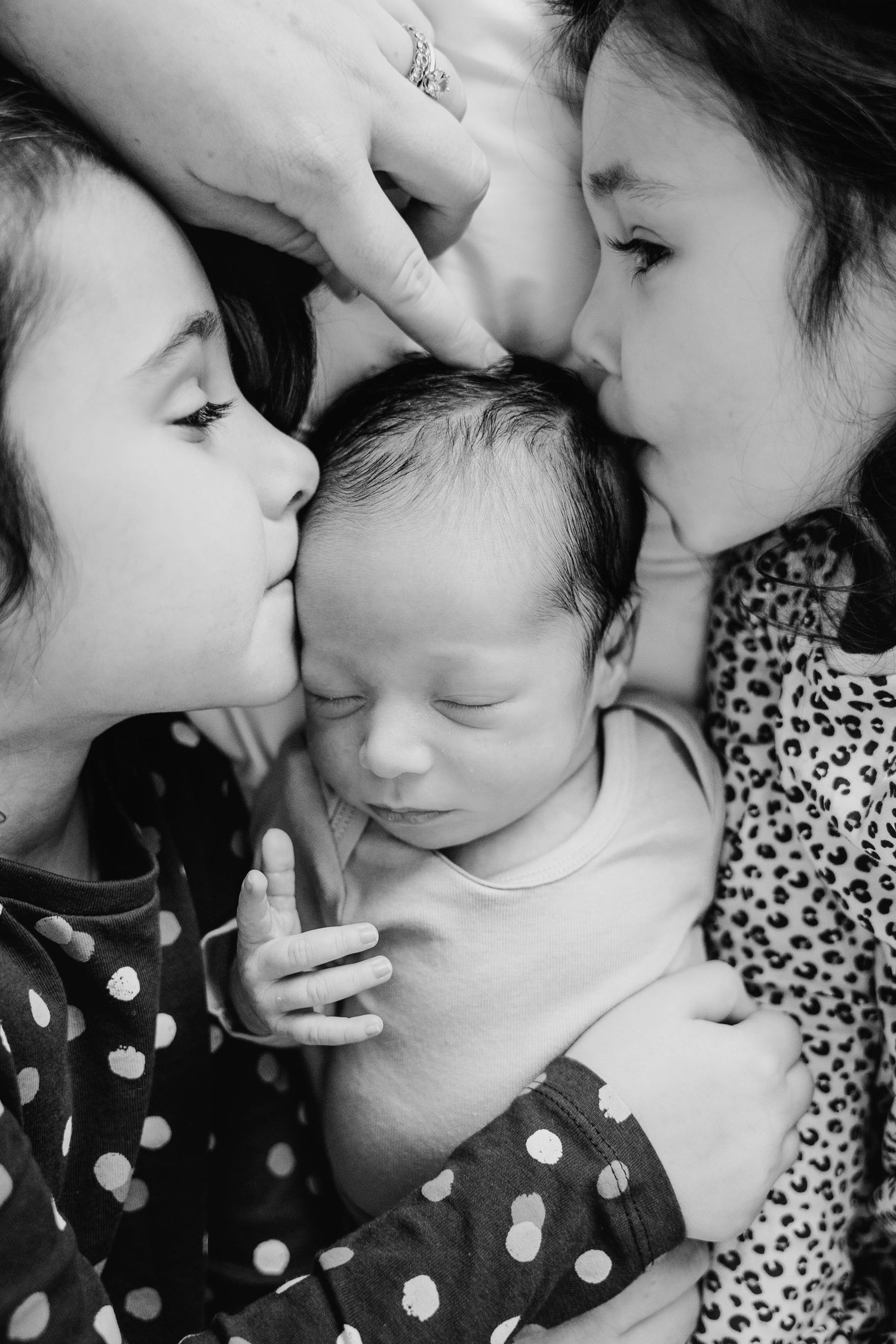 A touching series of black and white photos showing tender affectionate moments between parent and child. Family PHOTOGRAPHER Dublin