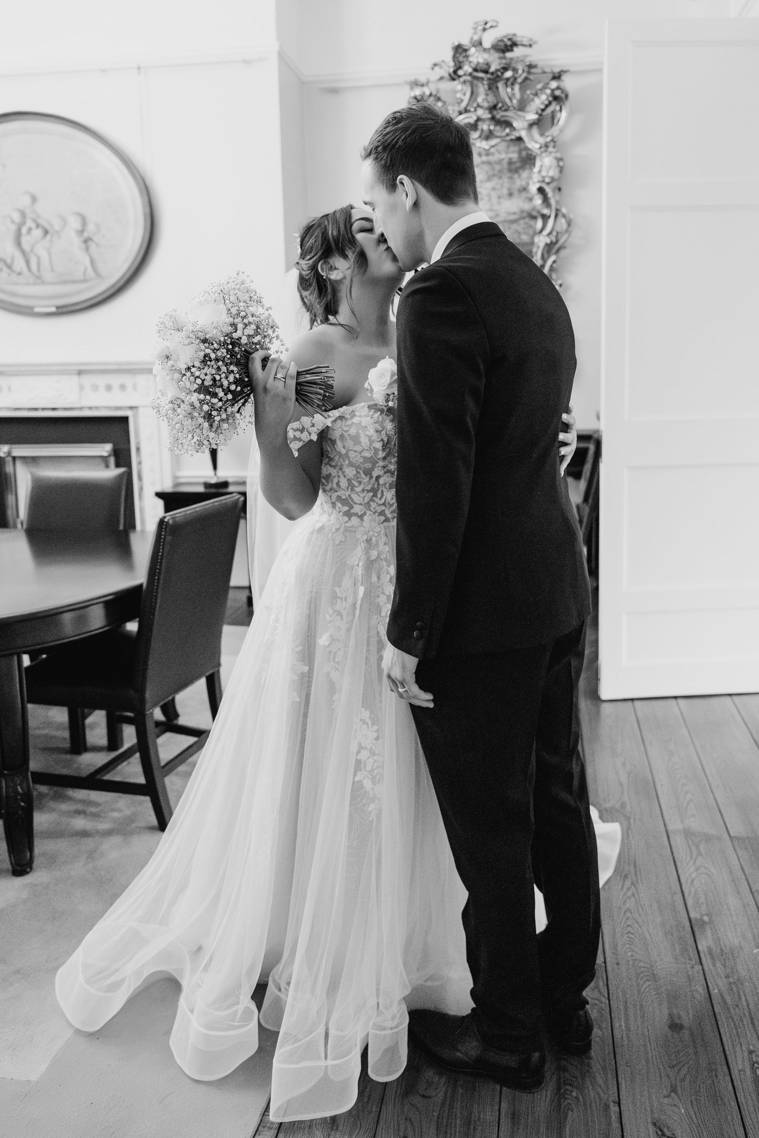 Intimate black and white portrait of newlyweds sharing a tender moment. Wedding PHOTOGRAPHER Dublin\