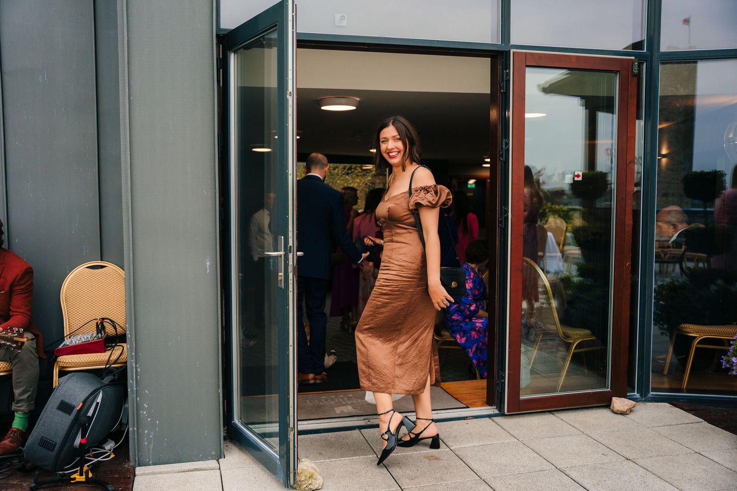 Modern building exterior with glass windows and sliding doors.Wedding Photography Trim Castle Ireland