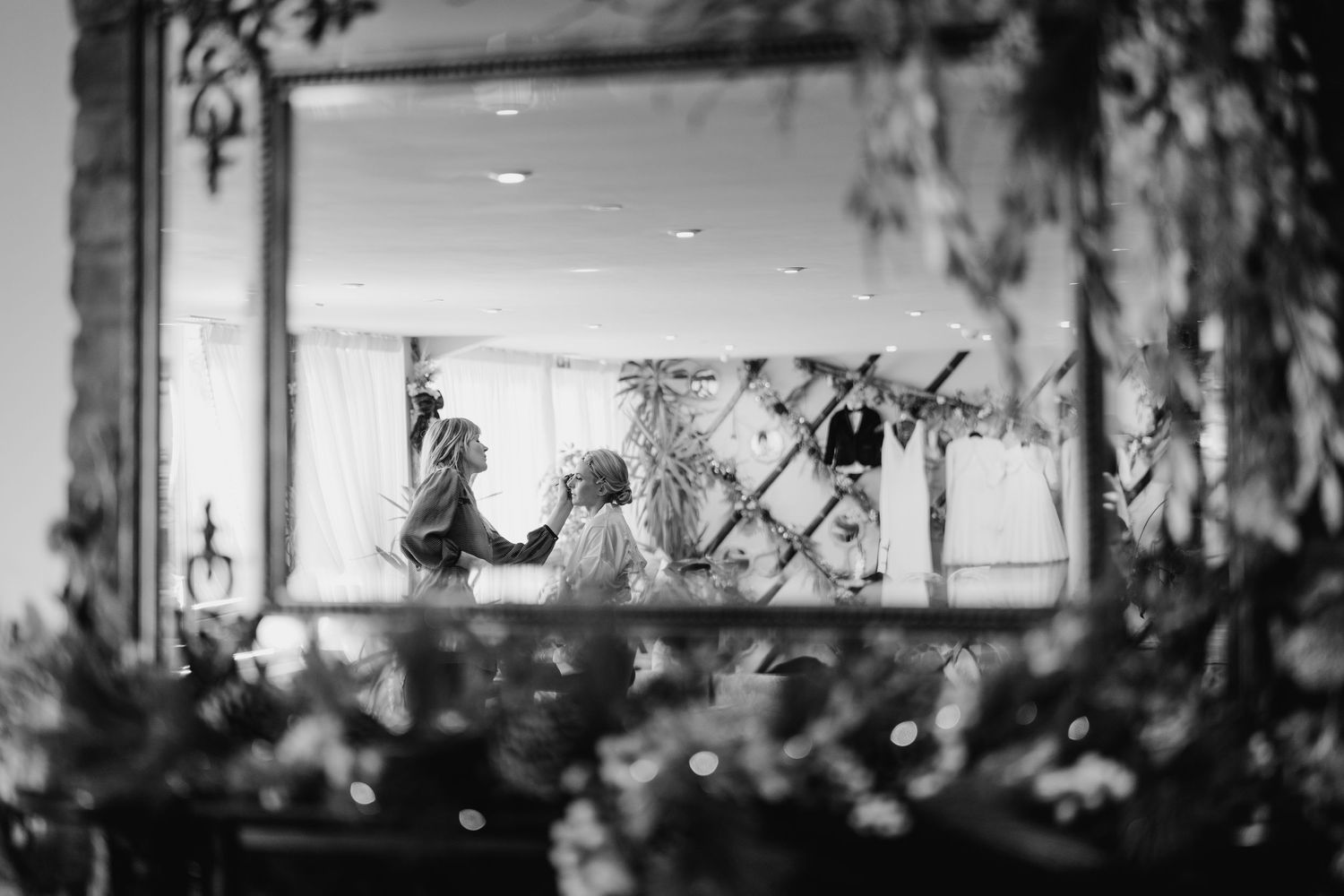 A row of illuminated holiday decorations and lights displayed at dusk in a festive outdoor setting. Ballymagarvey Wedding photographer