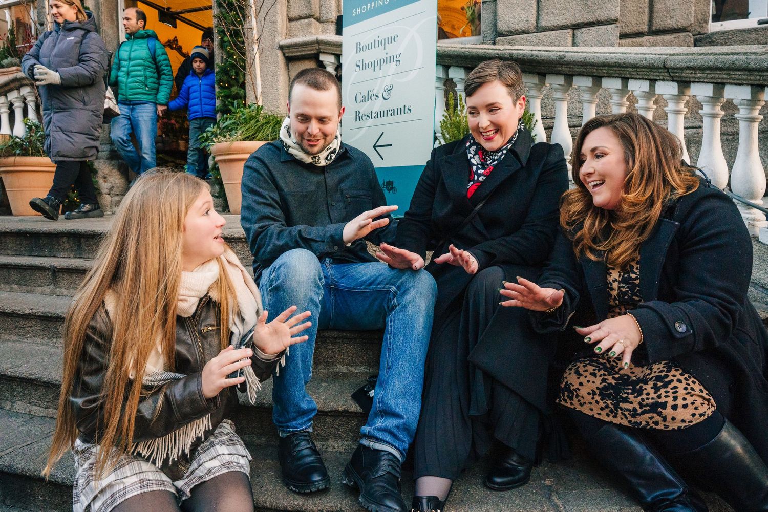 Natural family photography in Dublin city streets by a family photographer Dublin creating timeless holiday memories