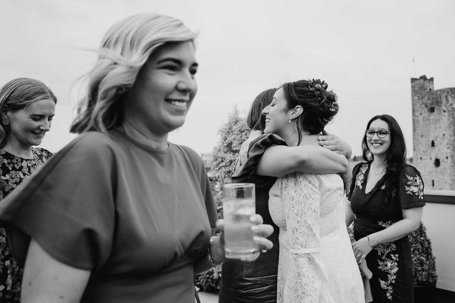 Candid black and white moments of laughter and joy during wedding celebration.Wedding Photography Trim Castle Ireland\