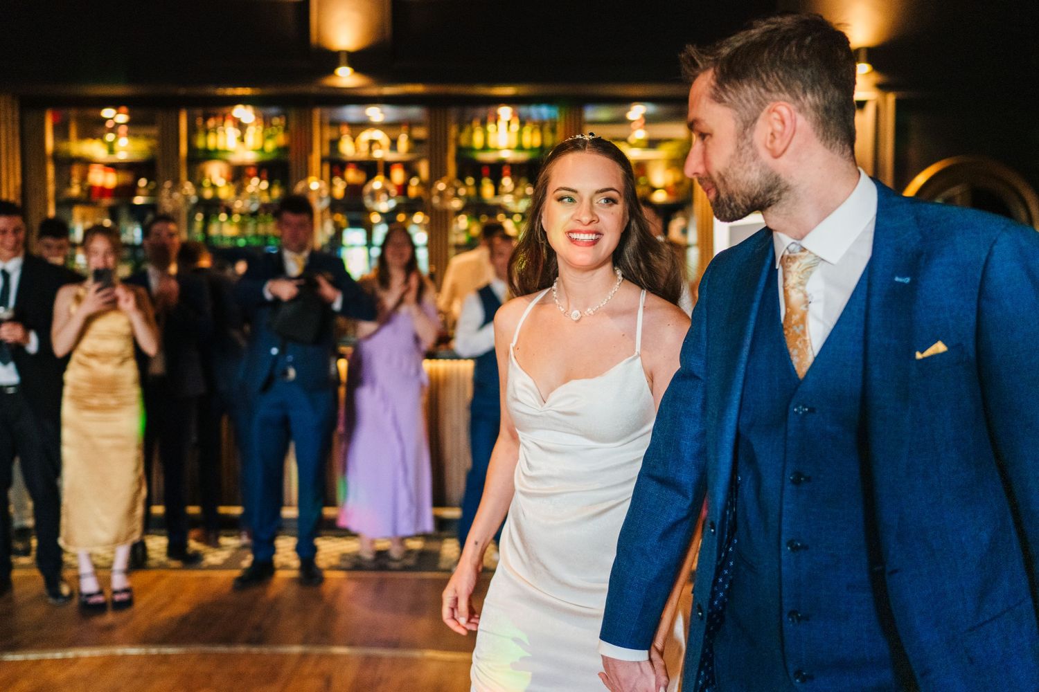 Poulaphouca Wedding photographer wicklow A couple shares a joyful moment on the dance floor at their wedding reception.
