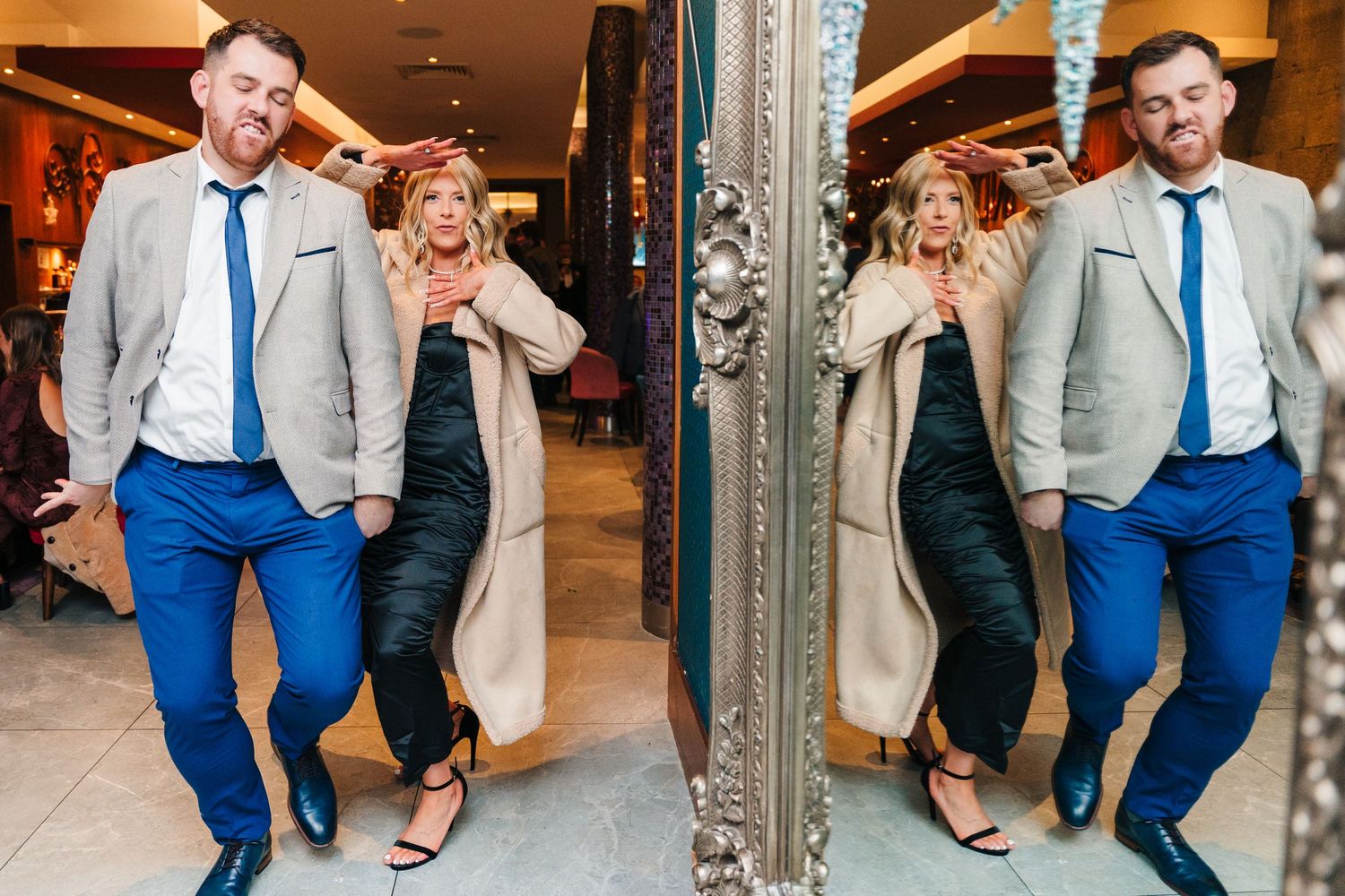 Wedding party celebration with groomsmen in blue pants and light jackets dancing in an ornate venue. City Hall Dublin Photographer