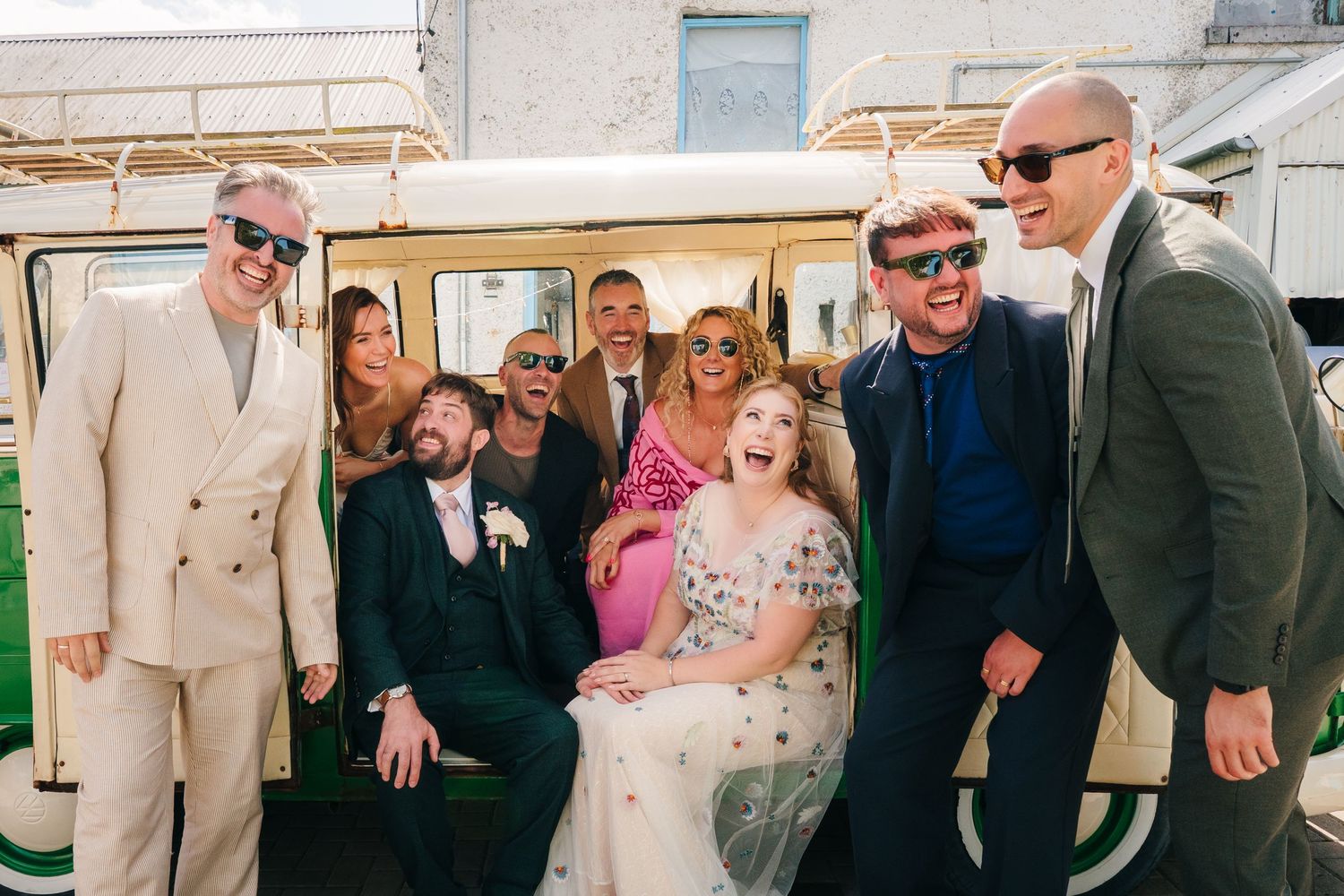 Wedding party members pose and laugh together in a candid black and white photo strip sequence. wedding photographer dublin pricing meath