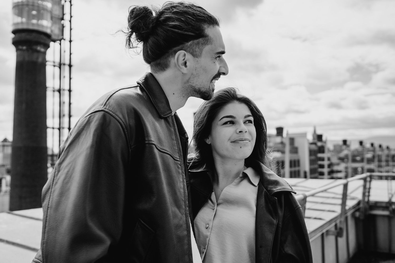 A monochromatic panoramic series of romantic couple portraits taken along an industrial city rooftop. Couple's Photoshoot PHOTOGRAPHER Dubli