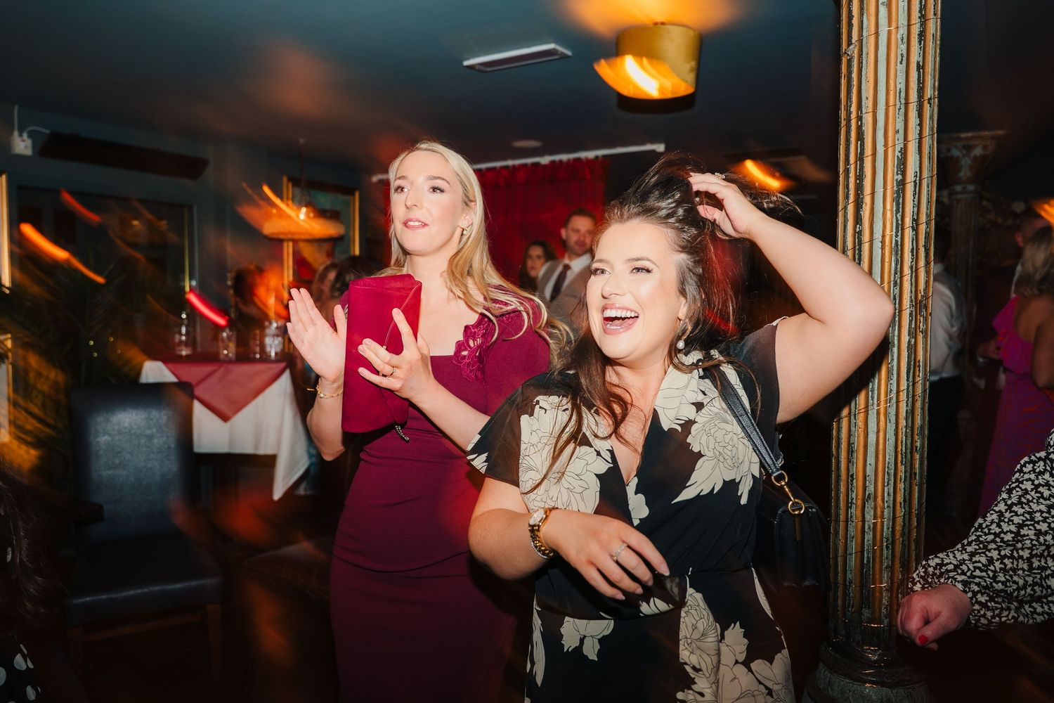 Energetic wedding reception scene showing guests dancing and celebrating on the dance floor. Marco Pierre Dublin Wedding Photographer