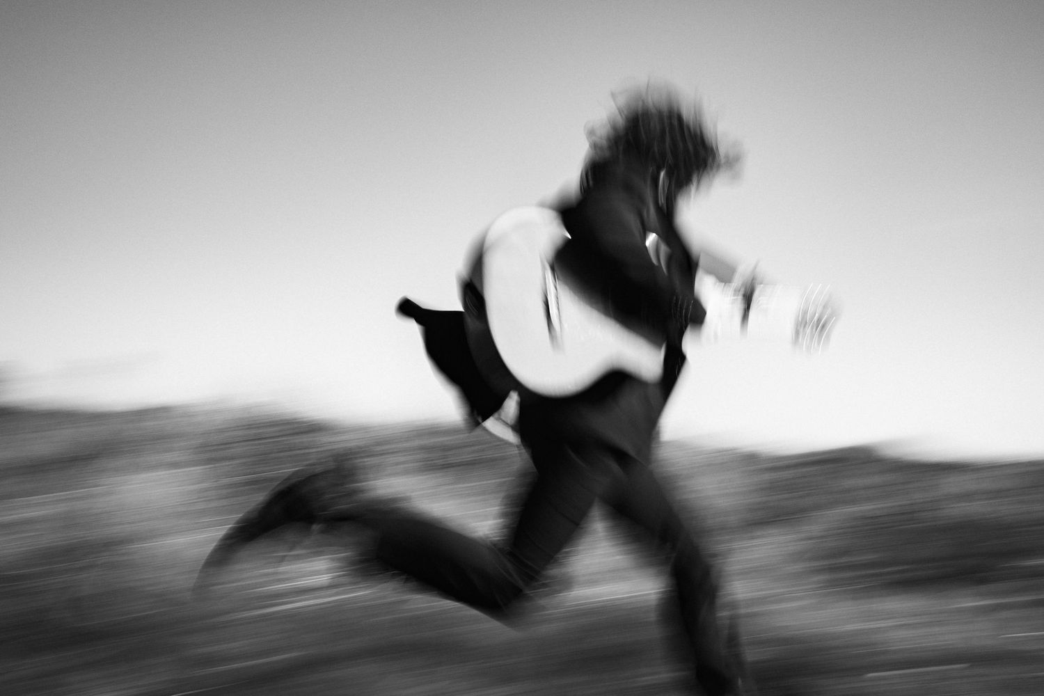 Black and white motion blur of running figure creating dynamic movement. PHOTOGRAPHER Dublin