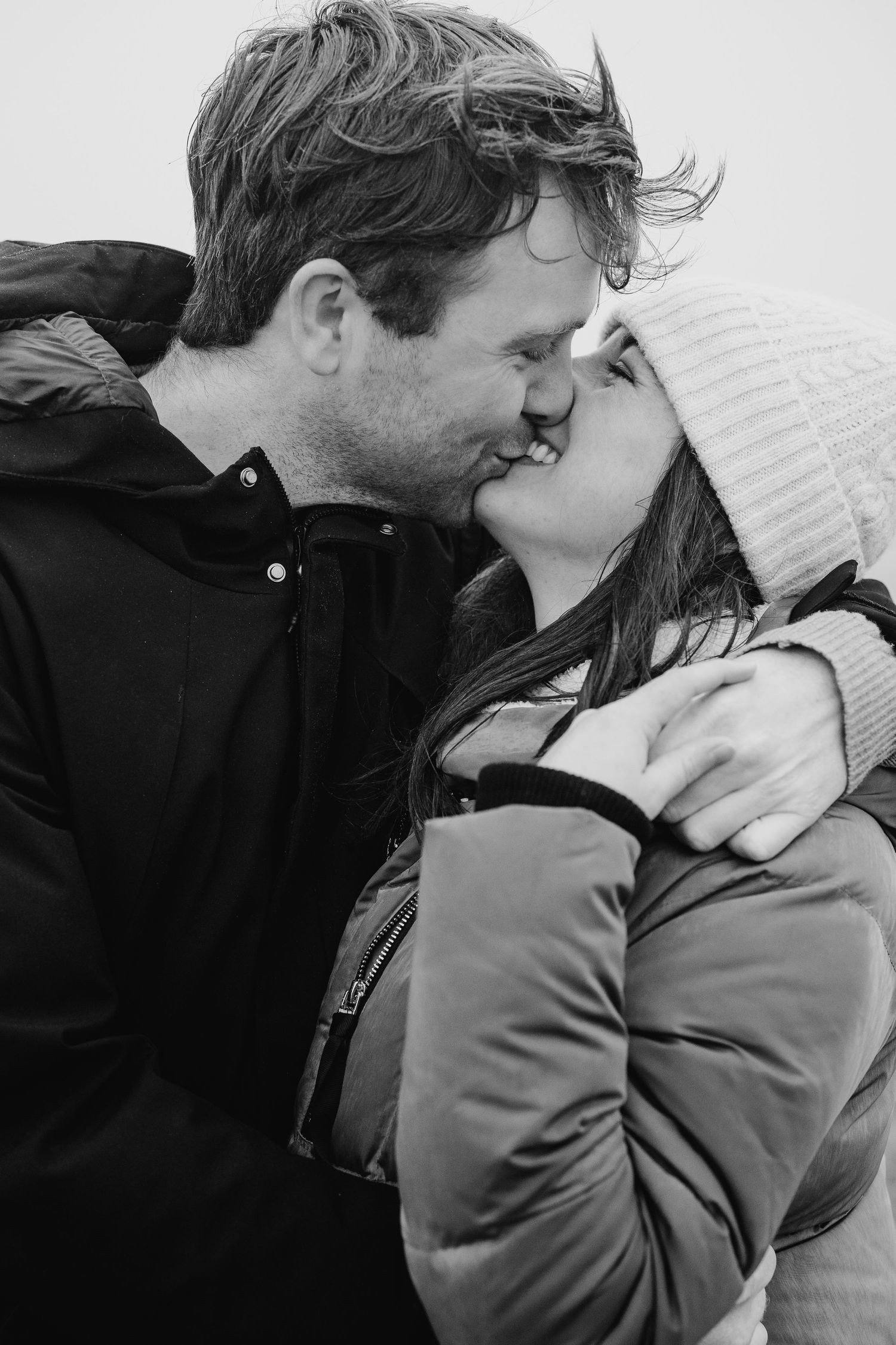 Series showing a couple having a tender moment outdoors while wearing winter coats and knit hats. PHOTOGRAPHER Dublin ireland