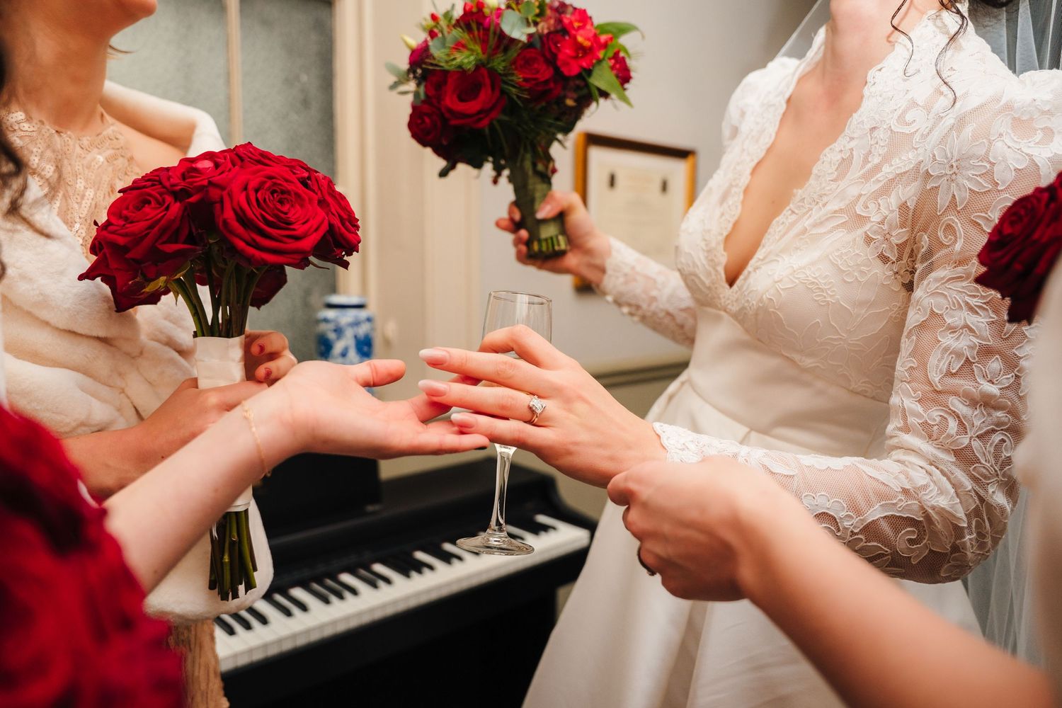 A series of close-up shots showing hands exchanging rings during a wedding ceremony. Stephens green club dublin Wedding photographer