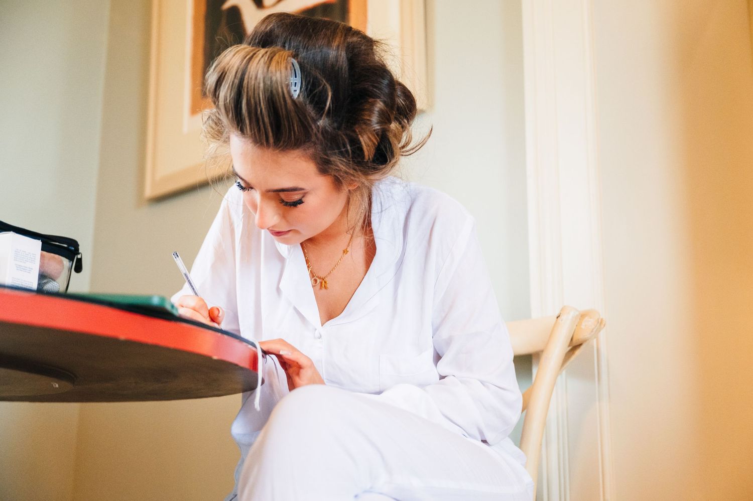 Close up shot of someone writing in calligraphy with black ink on white paper. Virginia Park Lodge Wedding Photographer Dublin Meath Ireland