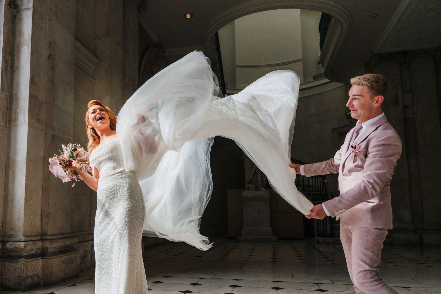 Wedding dress flowing dramatically in a series of artistic motion shots.  city hall dublin wedding photos