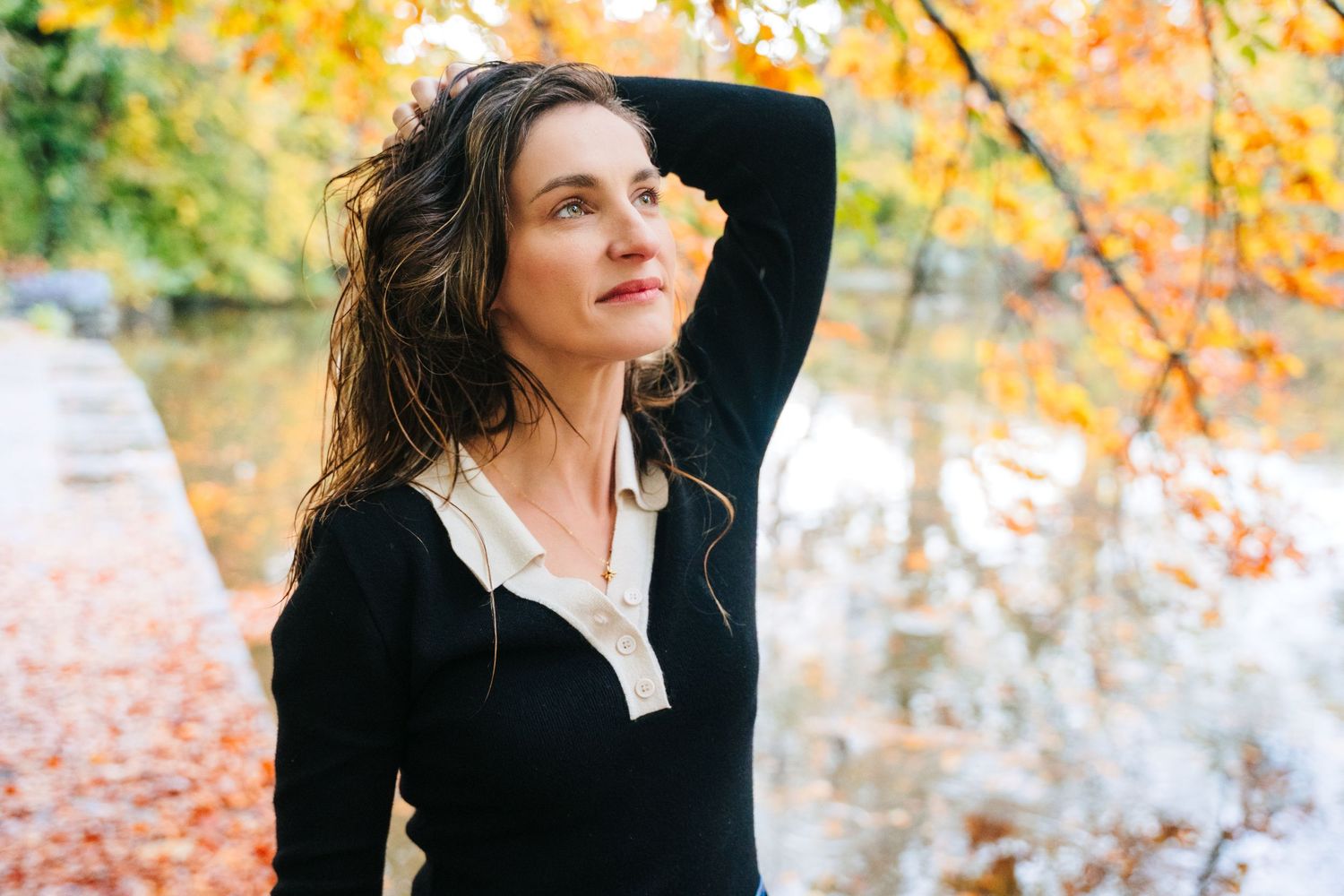 Autumn outdoor portrait with golden leaves and natural lighting. professional headshots dublin photographer