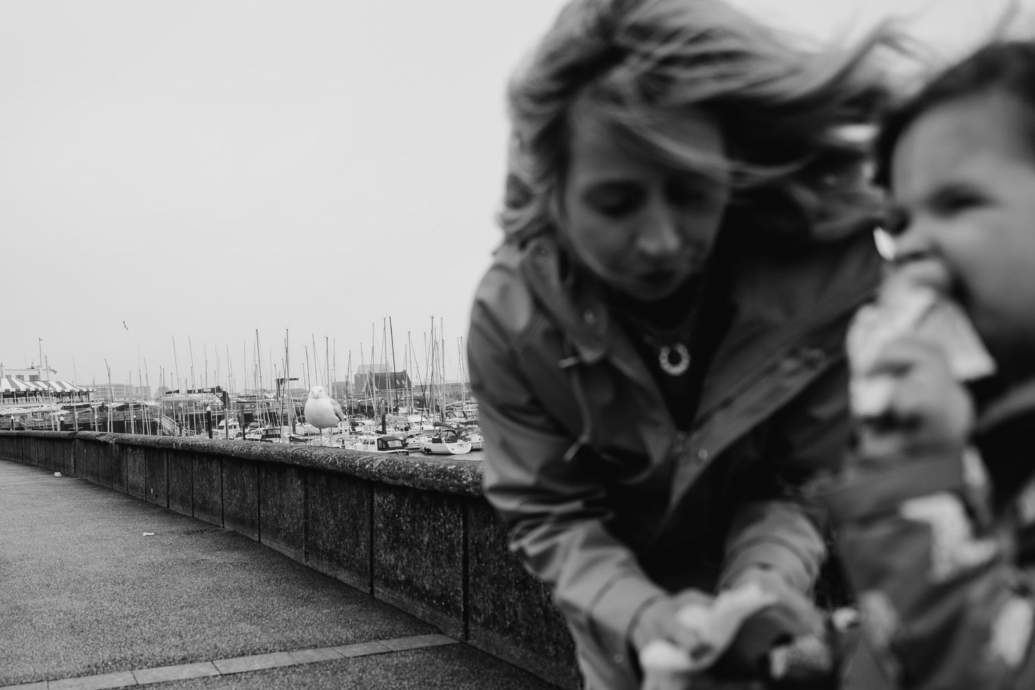 A windy black and white moment captured at a marina pier. PHOTOGRAPHER Dublin