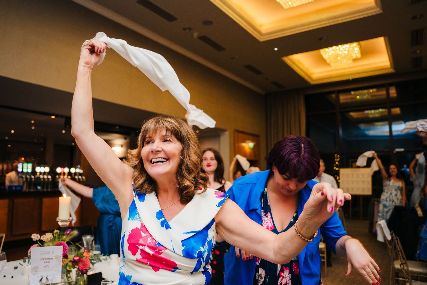 Wedding reception dance floor filled with celebrating guests under warm lighting.Wedding Photography Trim Castle Ireland