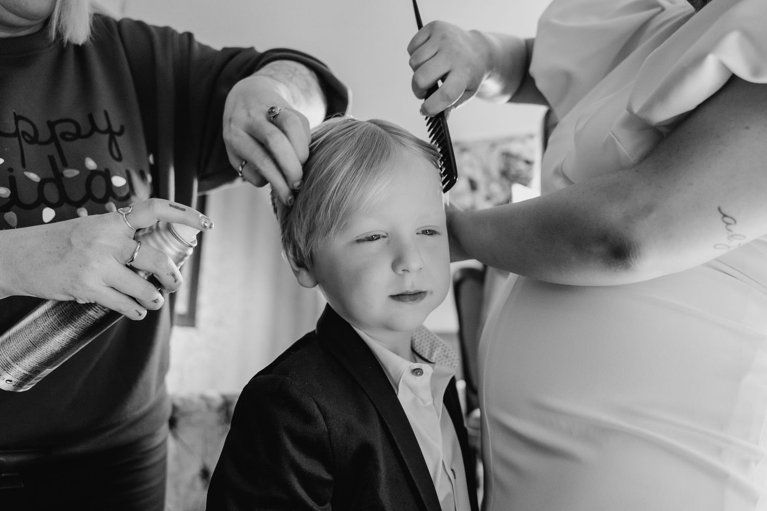 Black and white candid getting ready moments captured in sequence. Wedding photographer dublin