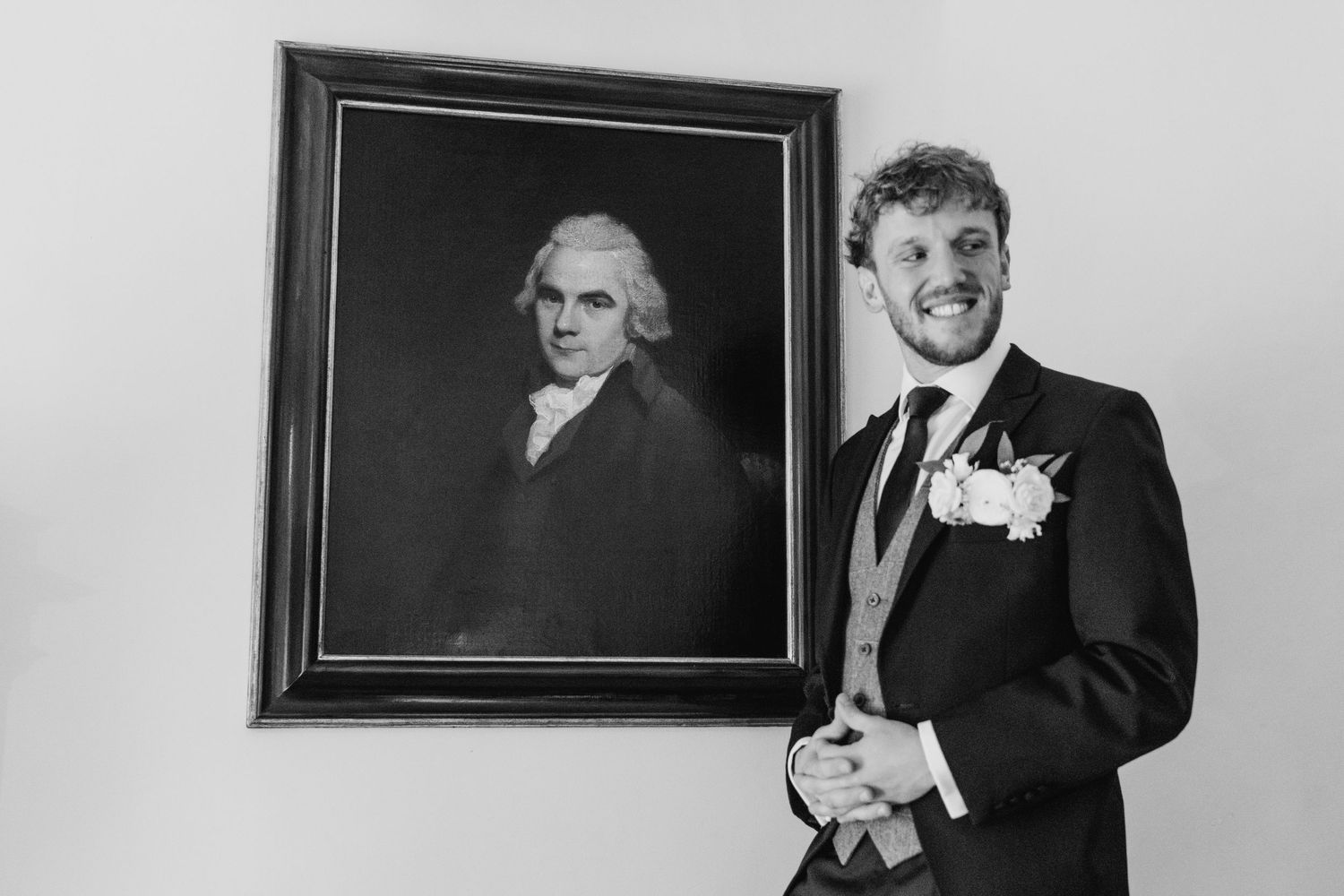 Black and white portraits of wedding party members arranged in vintage frames on a wall.  Virginia Park Lodge Wedding Photographer Cavan Dub