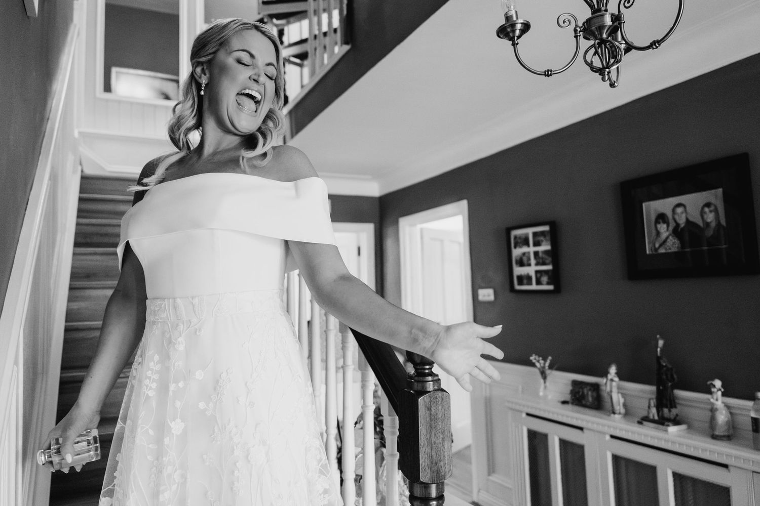 A series of black and white photos capturing joyful moments during wedding preparations in a brightly lit room. The Dean Dublin Wedding Phot