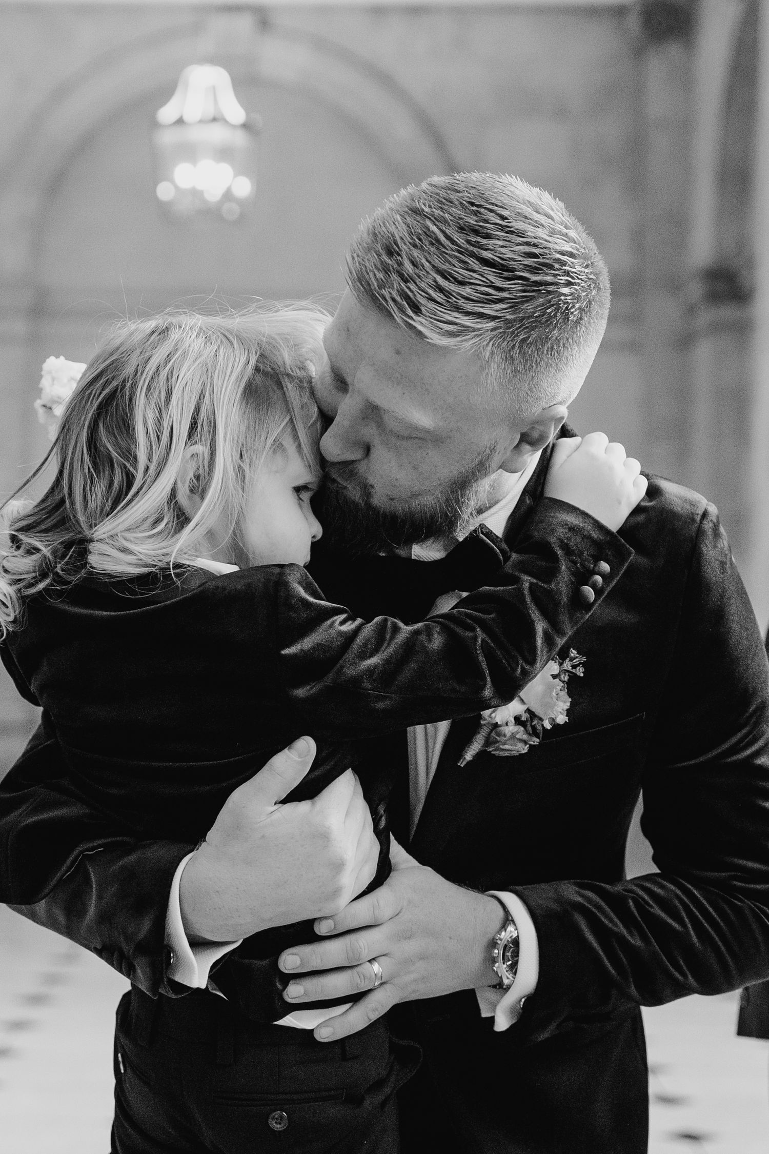 Black and white portraits capture tender moments between the newlyweds. City Hall Dublin Photographer