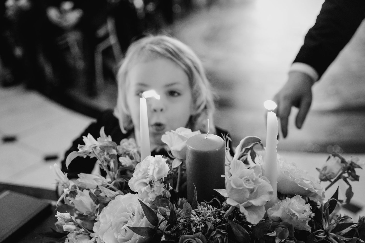 Close-up shots of delicate floral arrangements with mixed blooms at a wedding celebration. Wedding photographer dublin